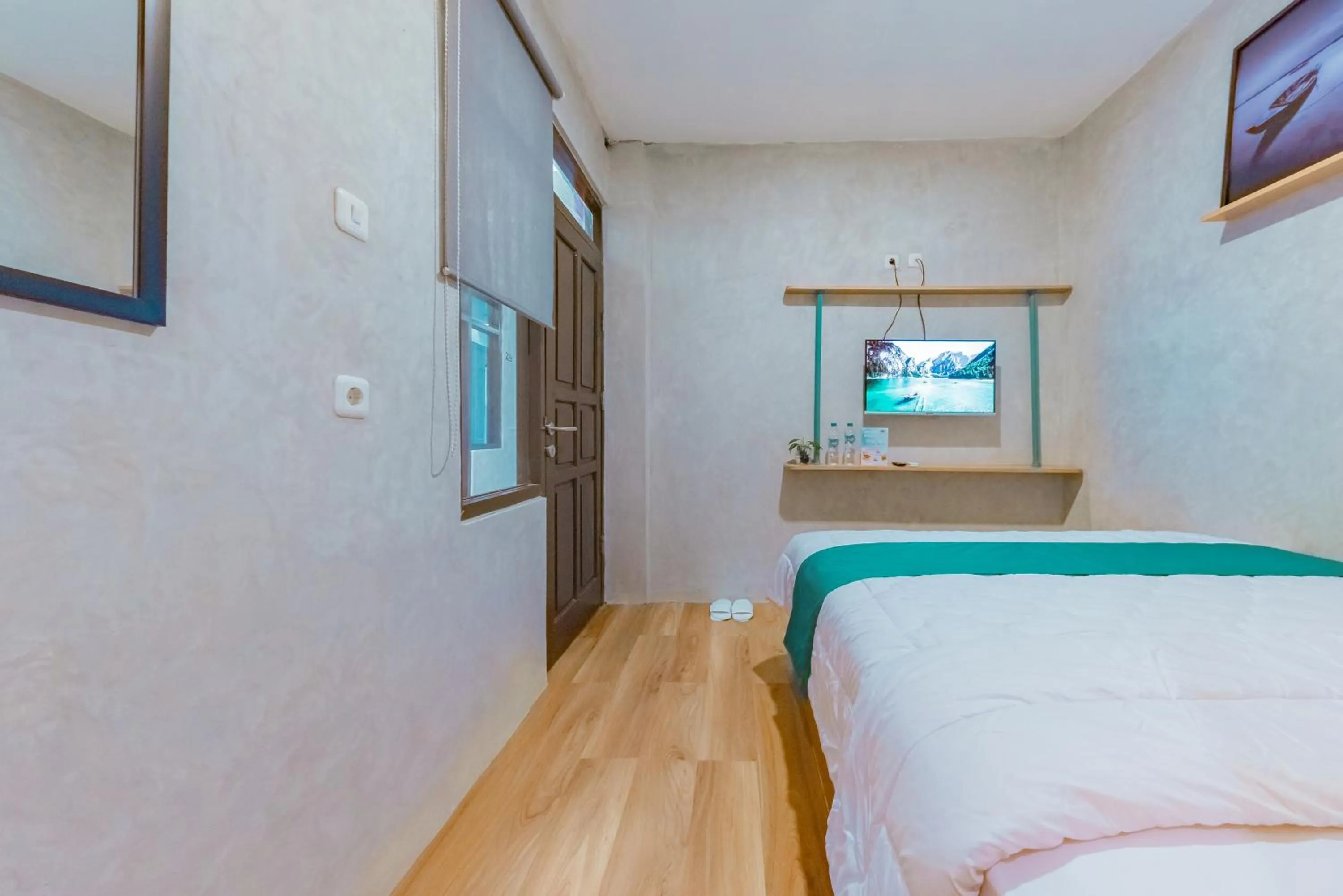 Bed in Ultima Guest House