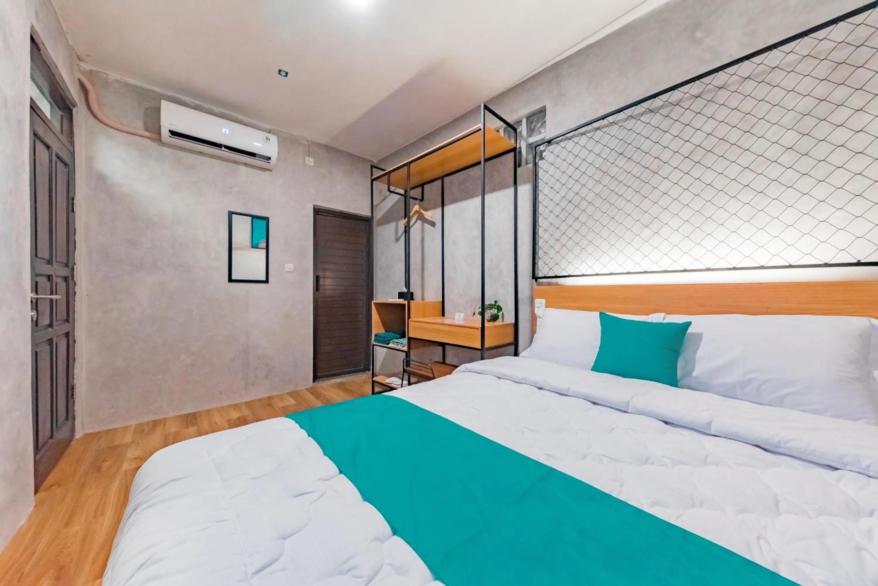 Bed in Ultima Guest House