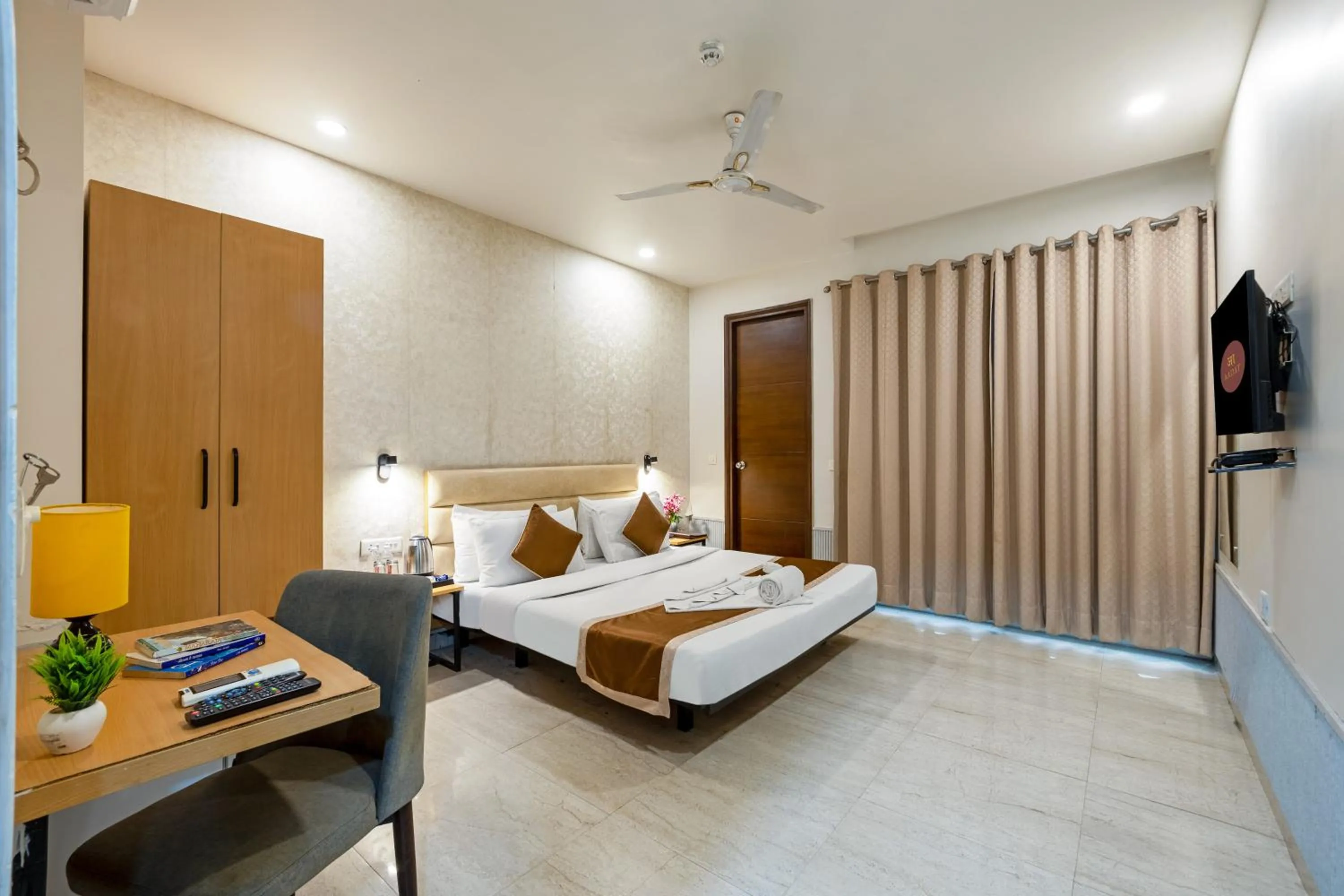 Bed in Aadat Hotel Subhash Chowk Gurgaon