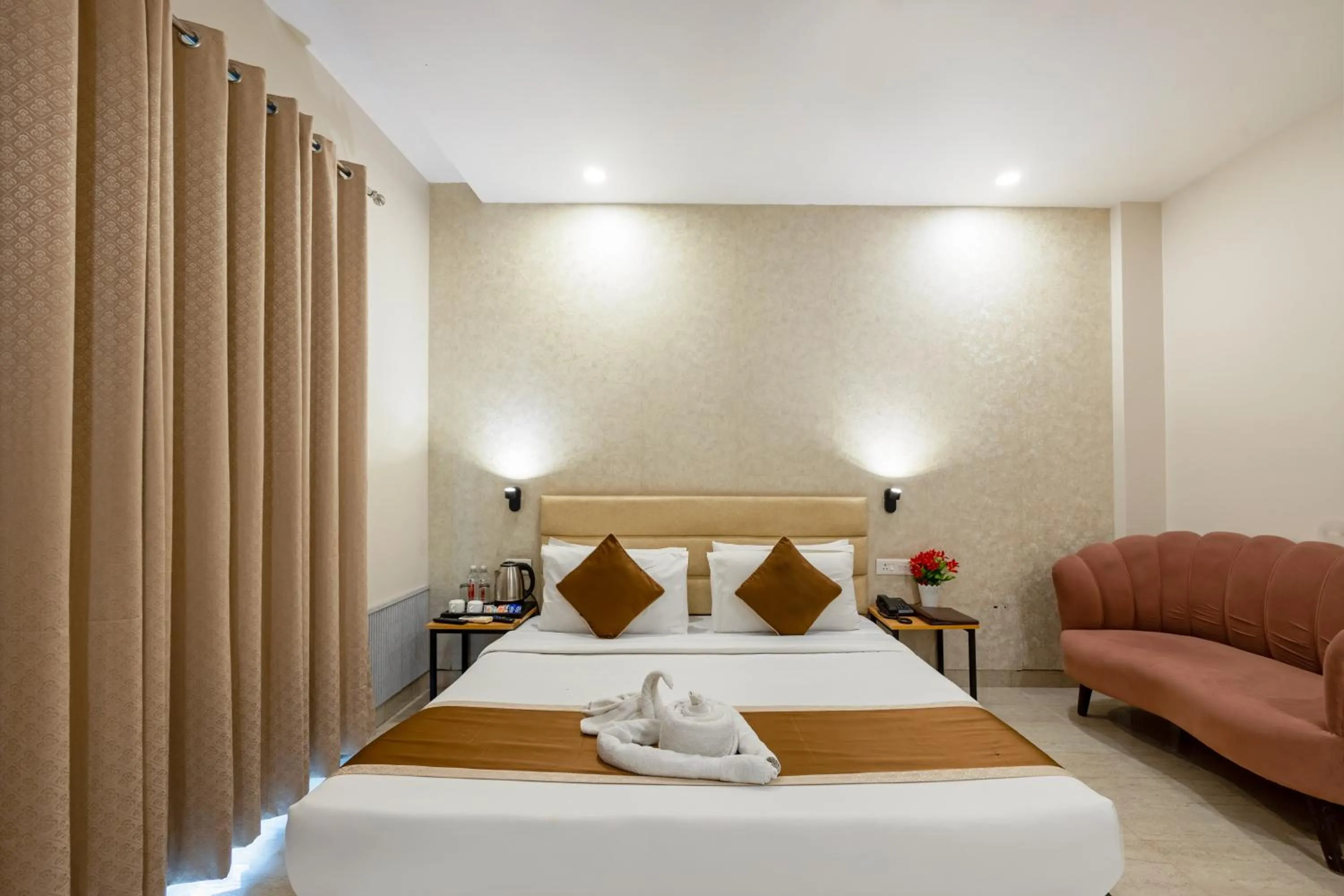 Bed in Aadat Hotel Subhash Chowk Gurgaon