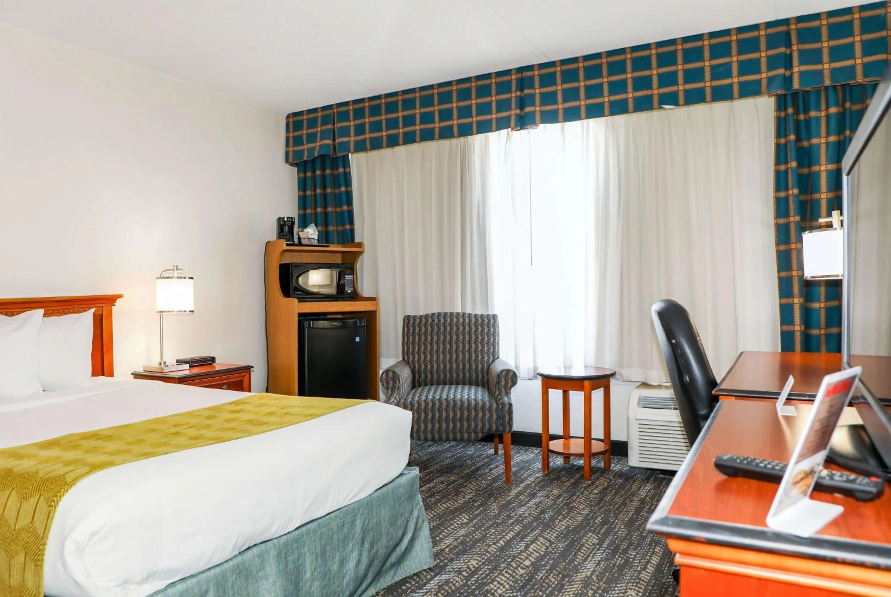 Photo of the whole room, Bed in Ramada by Wyndham Cumberland Downtown