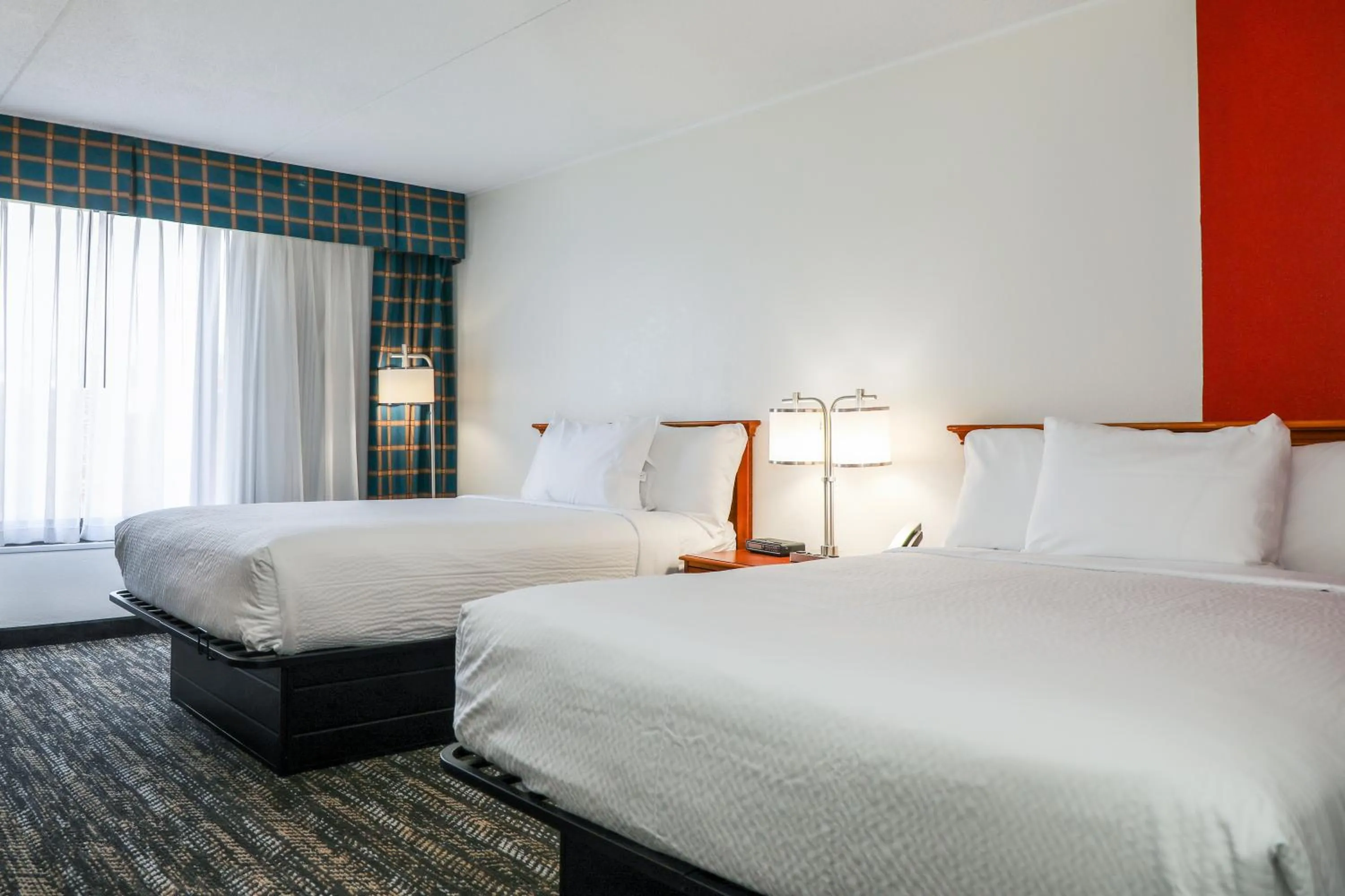 Photo of the whole room, Bed in Ramada by Wyndham Cumberland Downtown