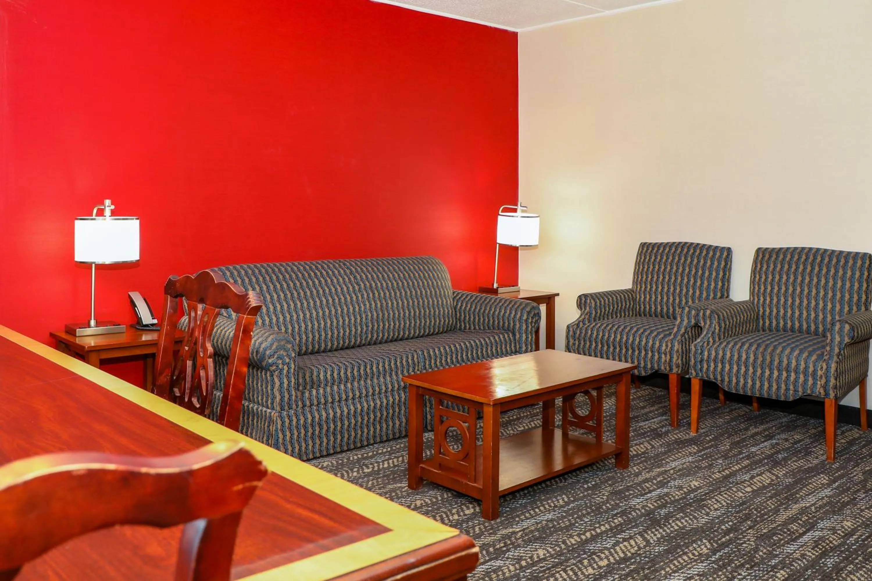 Living room in Ramada by Wyndham Cumberland Downtown