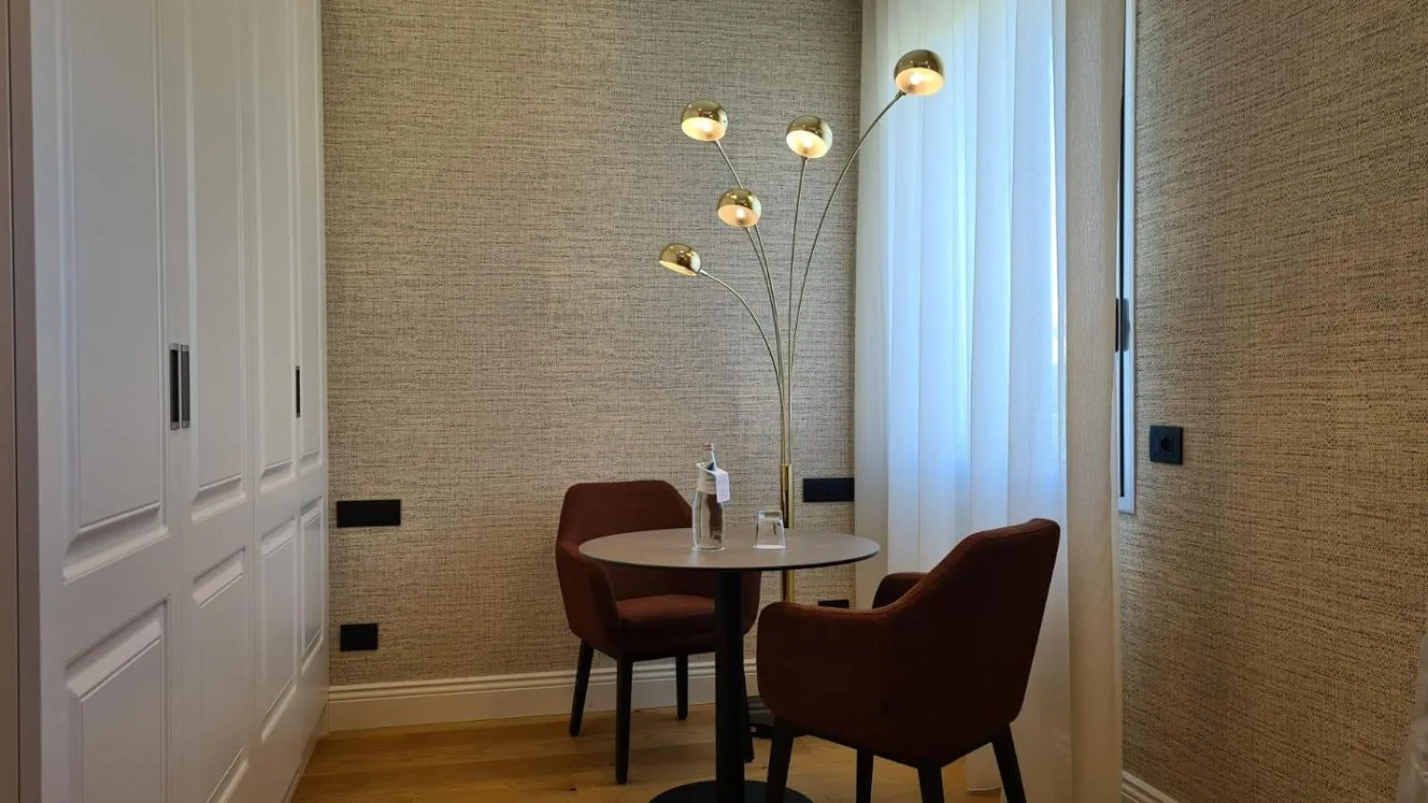 Seating area in Jolly Charme Suite