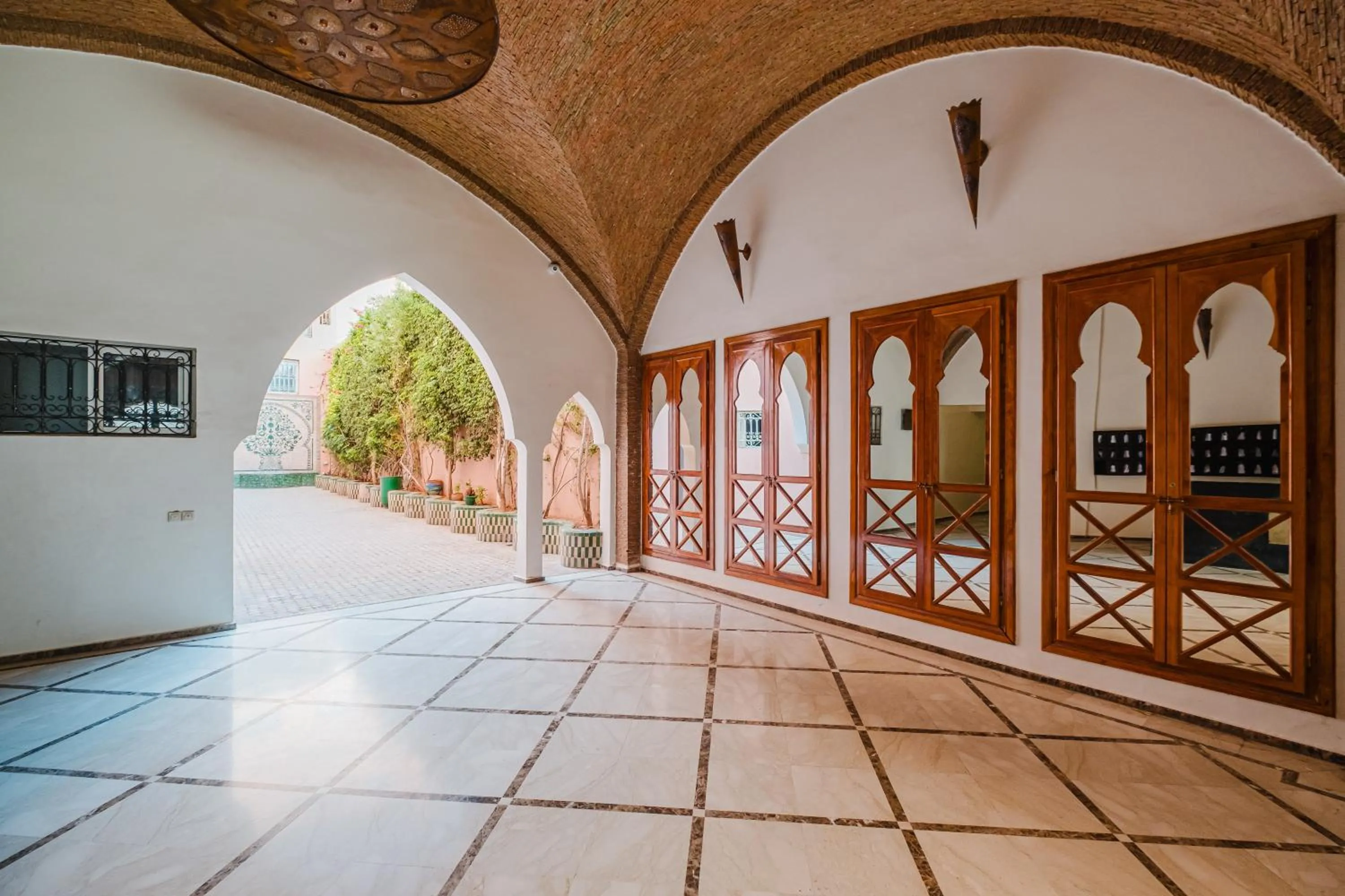 Property building in Amoud Apartments - Stylish Comfort at Residence Dyar Al Kheir