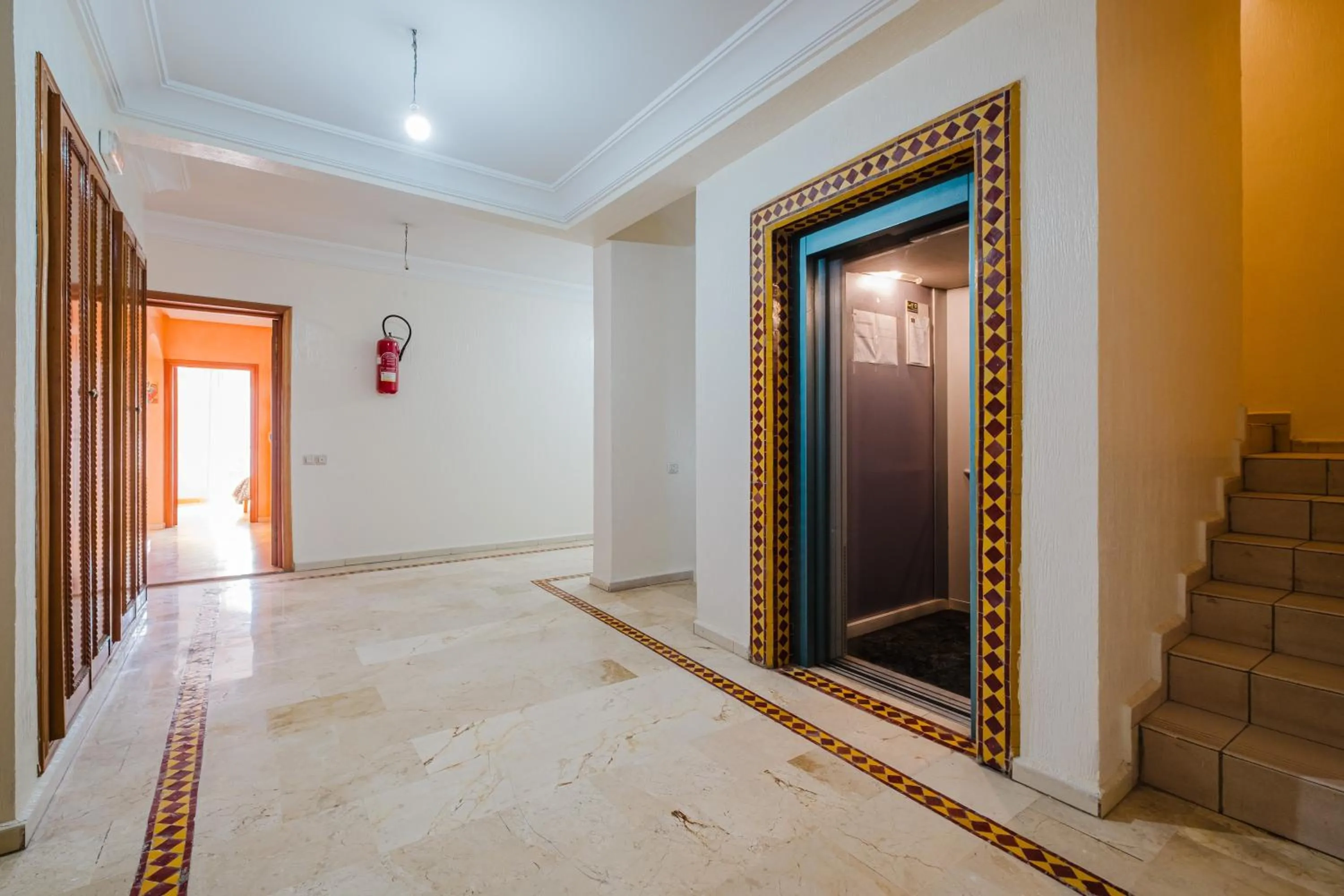 elevator in Amoud Apartments - Stylish Comfort at Residence Dyar Al Kheir