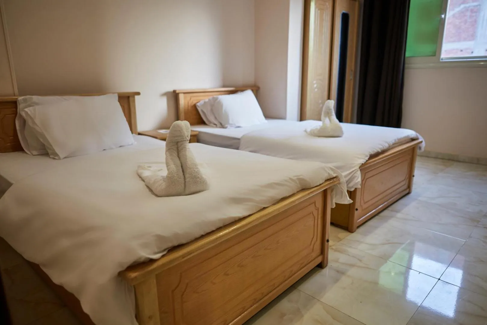 Bed in Grand Pyramid View Hotel