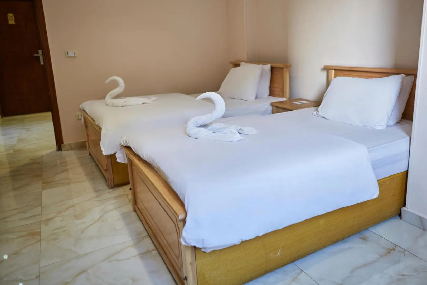 Bed in Grand Pyramid View Hotel