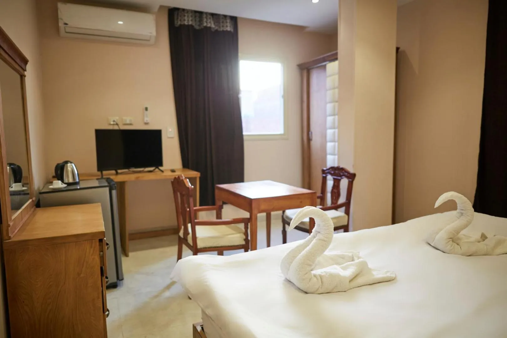 Bed in Grand Pyramid View Hotel