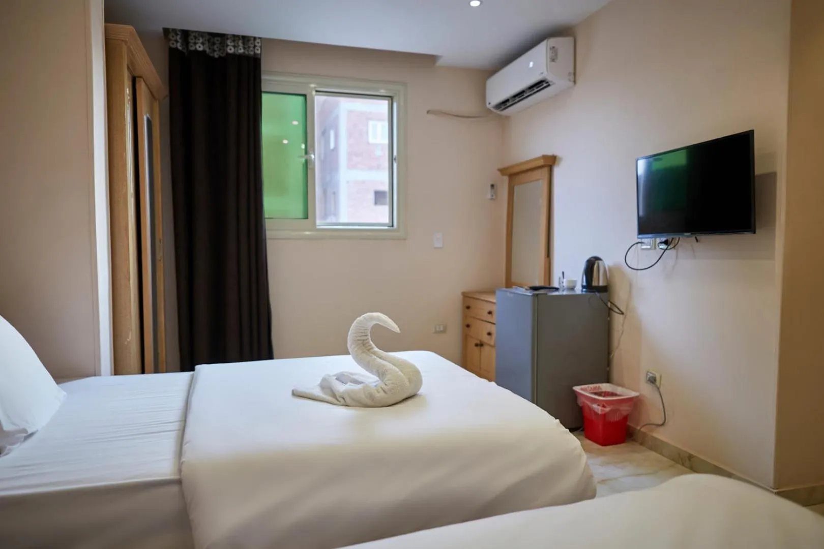 Bed in Grand Pyramid View Hotel