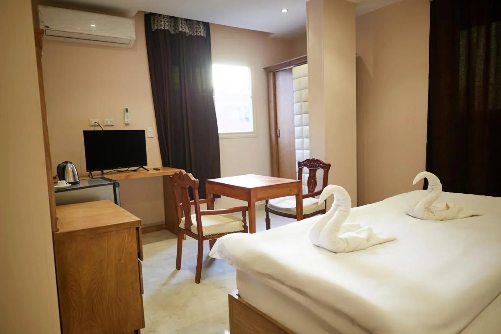 Bed in Grand Pyramid View Hotel