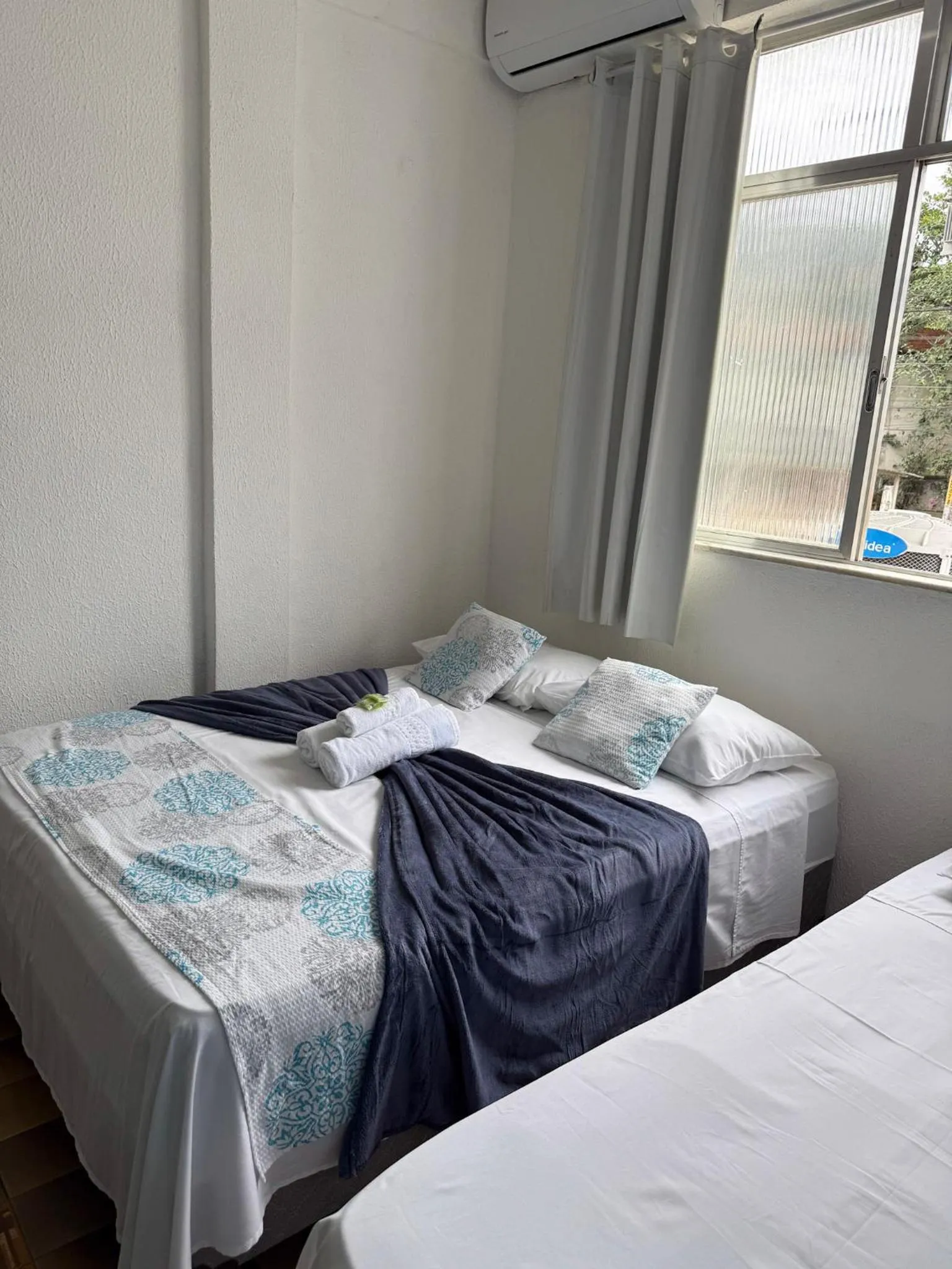 Bed in Pousada Lisamar