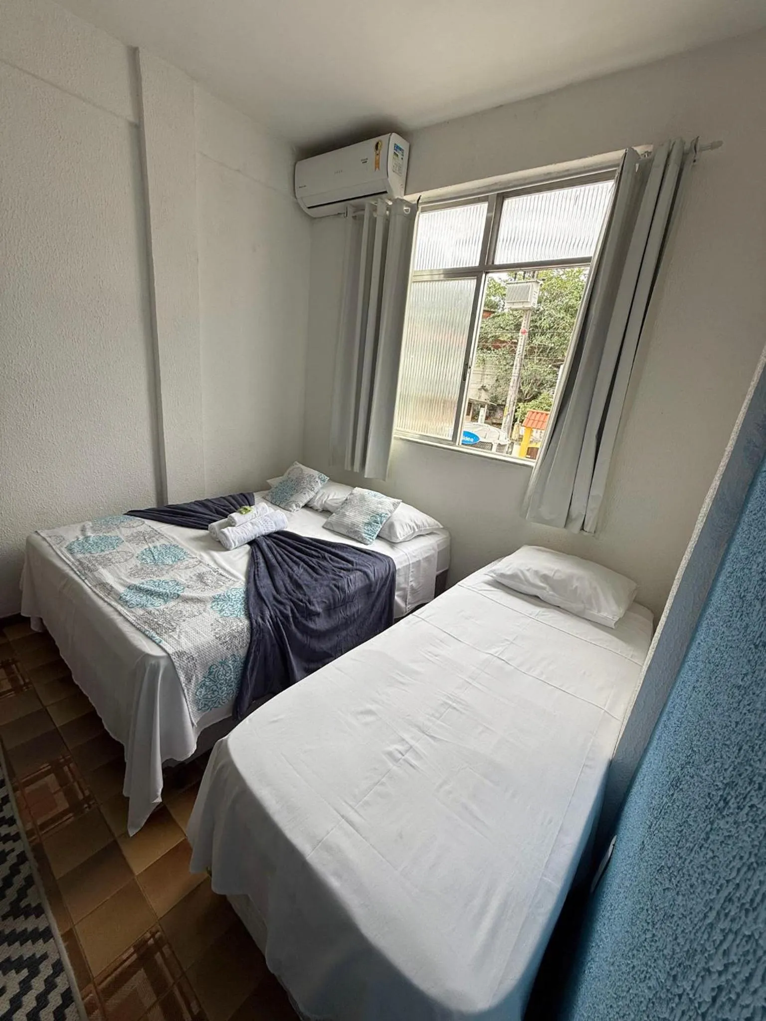 Bed in Pousada Lisamar