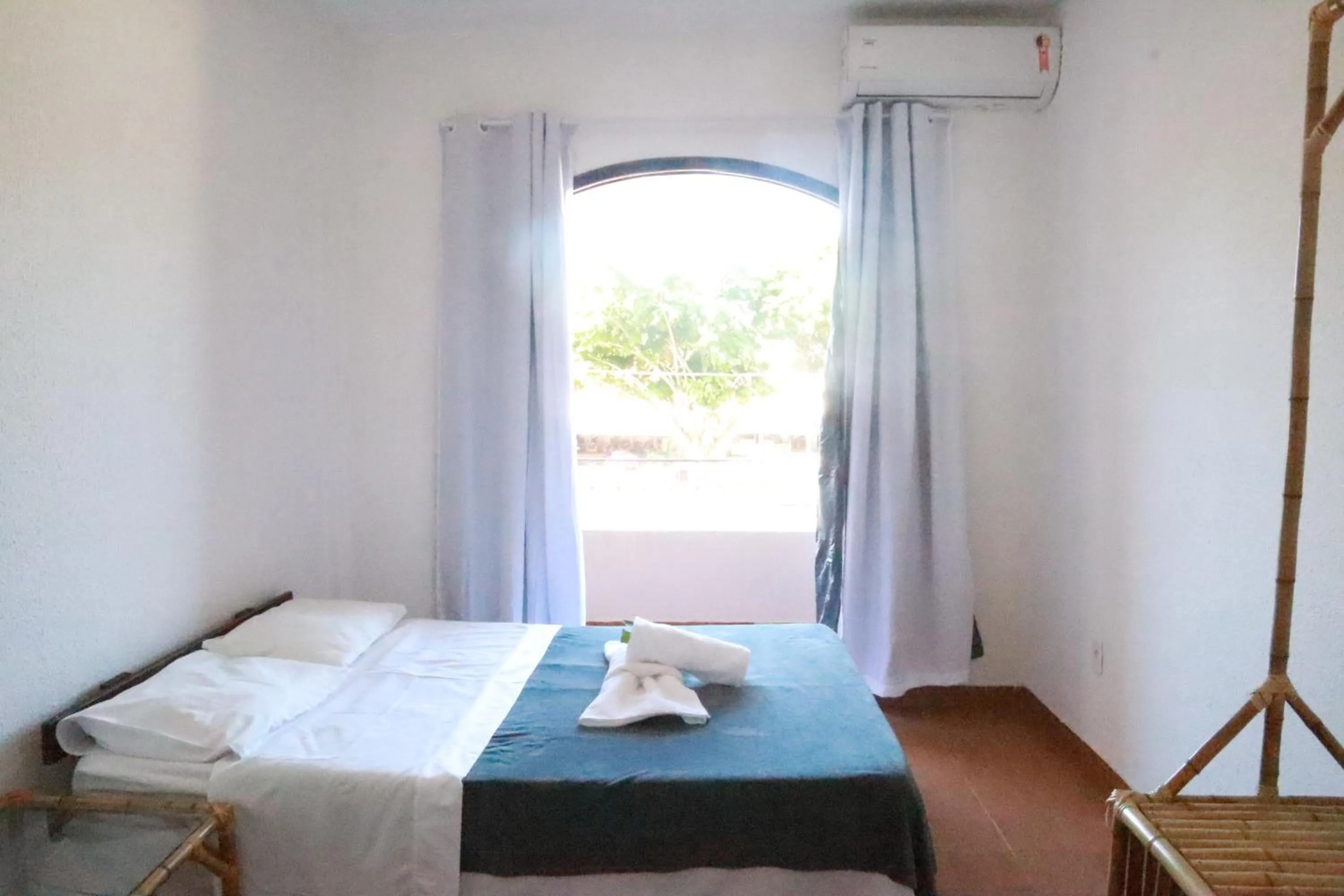 Bed in Pousada Lisamar