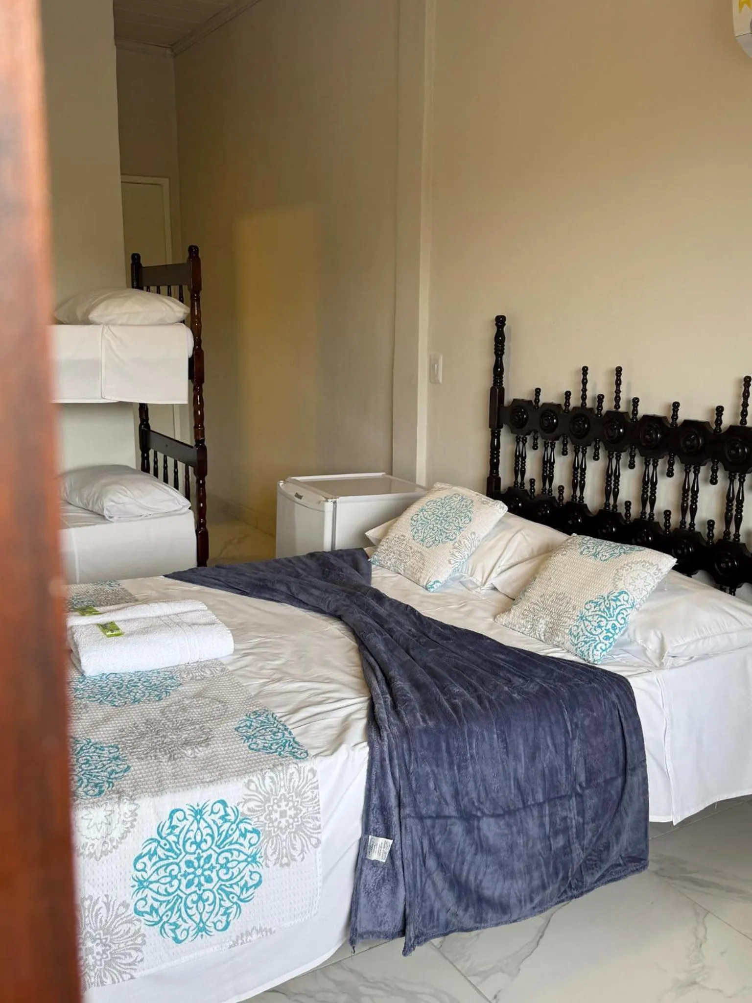 Bed in Pousada Lisamar