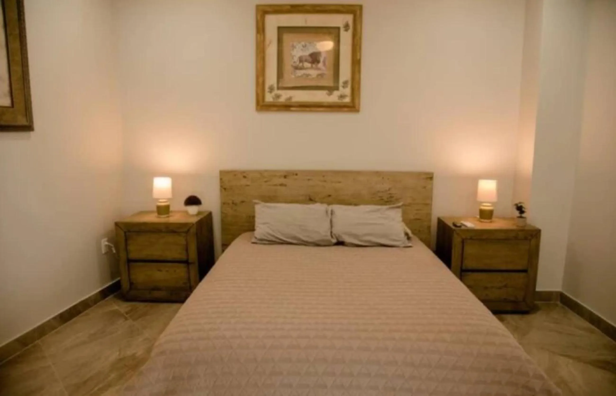 Bed in Capitan Boutique Resort