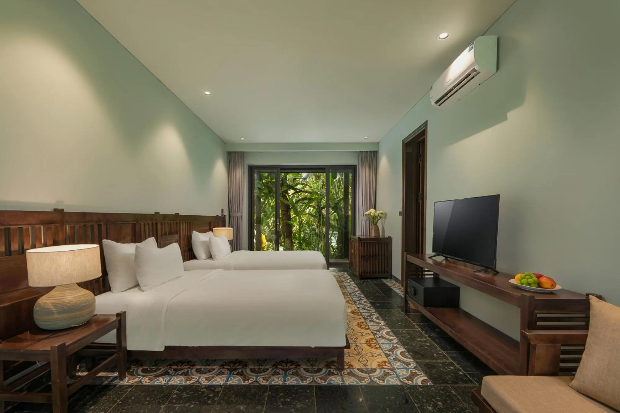 Communal lounge/ TV room, Bed in Coco Island Resort Ninh Binh