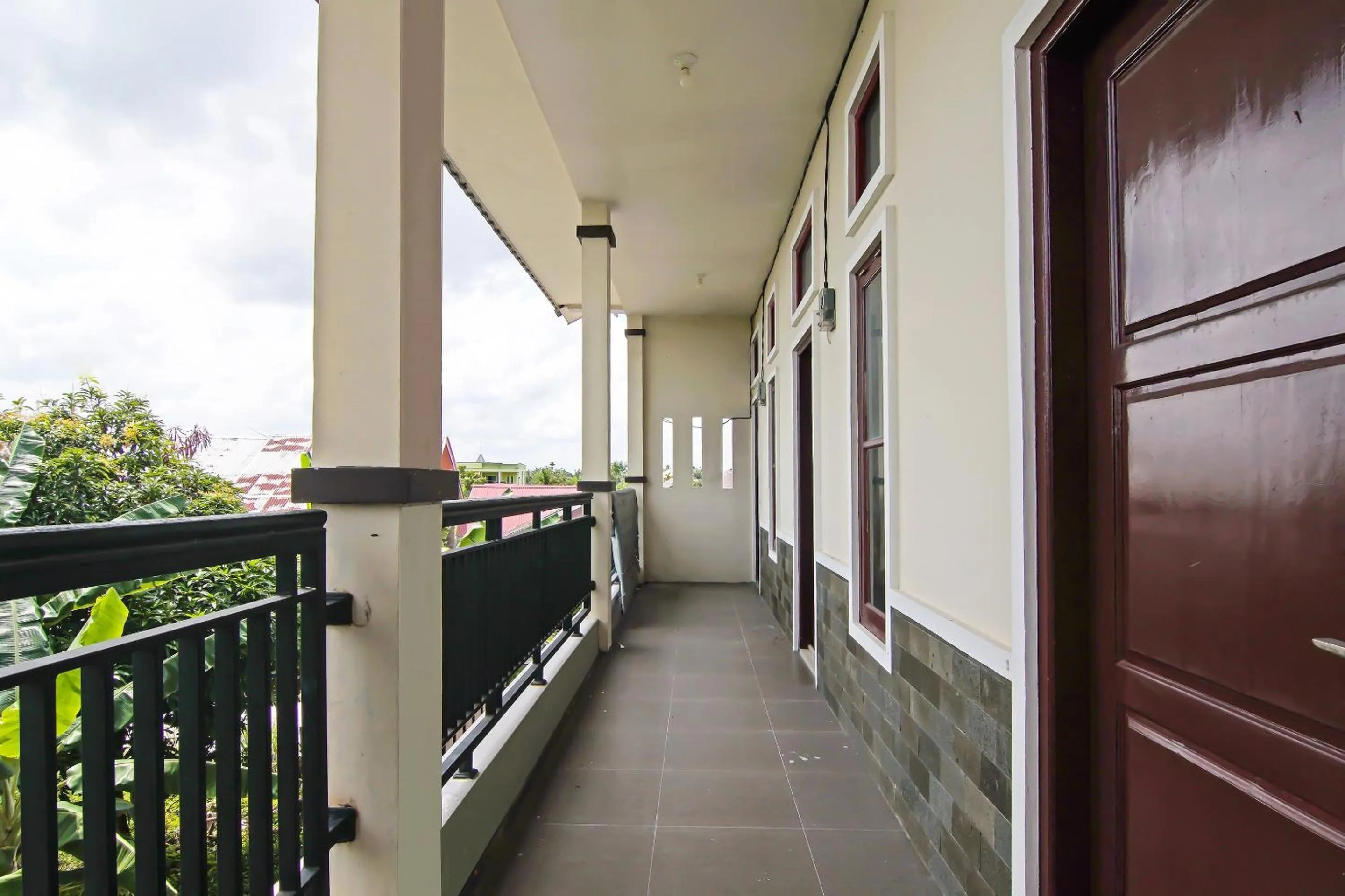 Lobby or reception in Hotel O Putri Guest House Syariah Near SPBU Rimbo Panjang