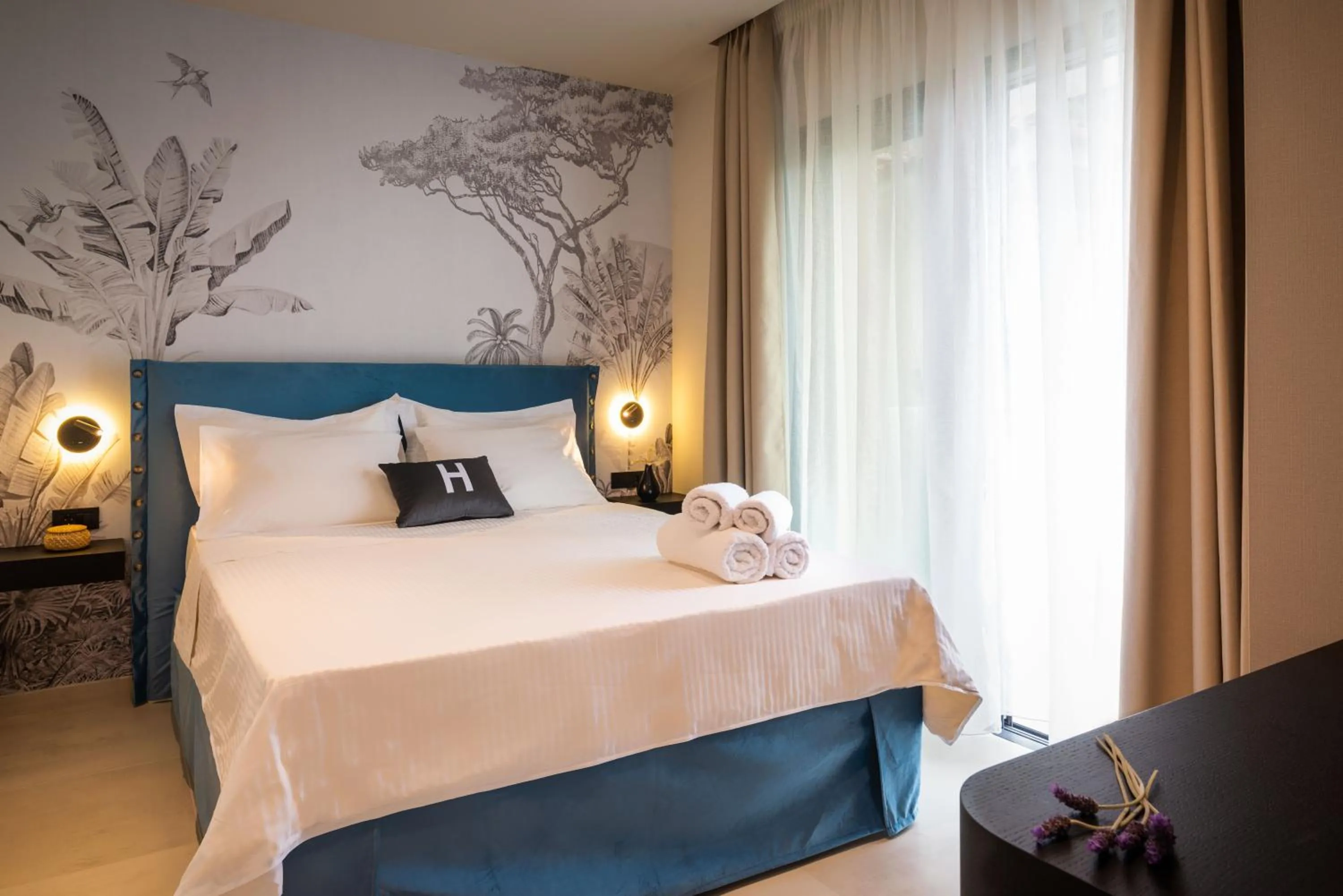 Bed in Hara Suites