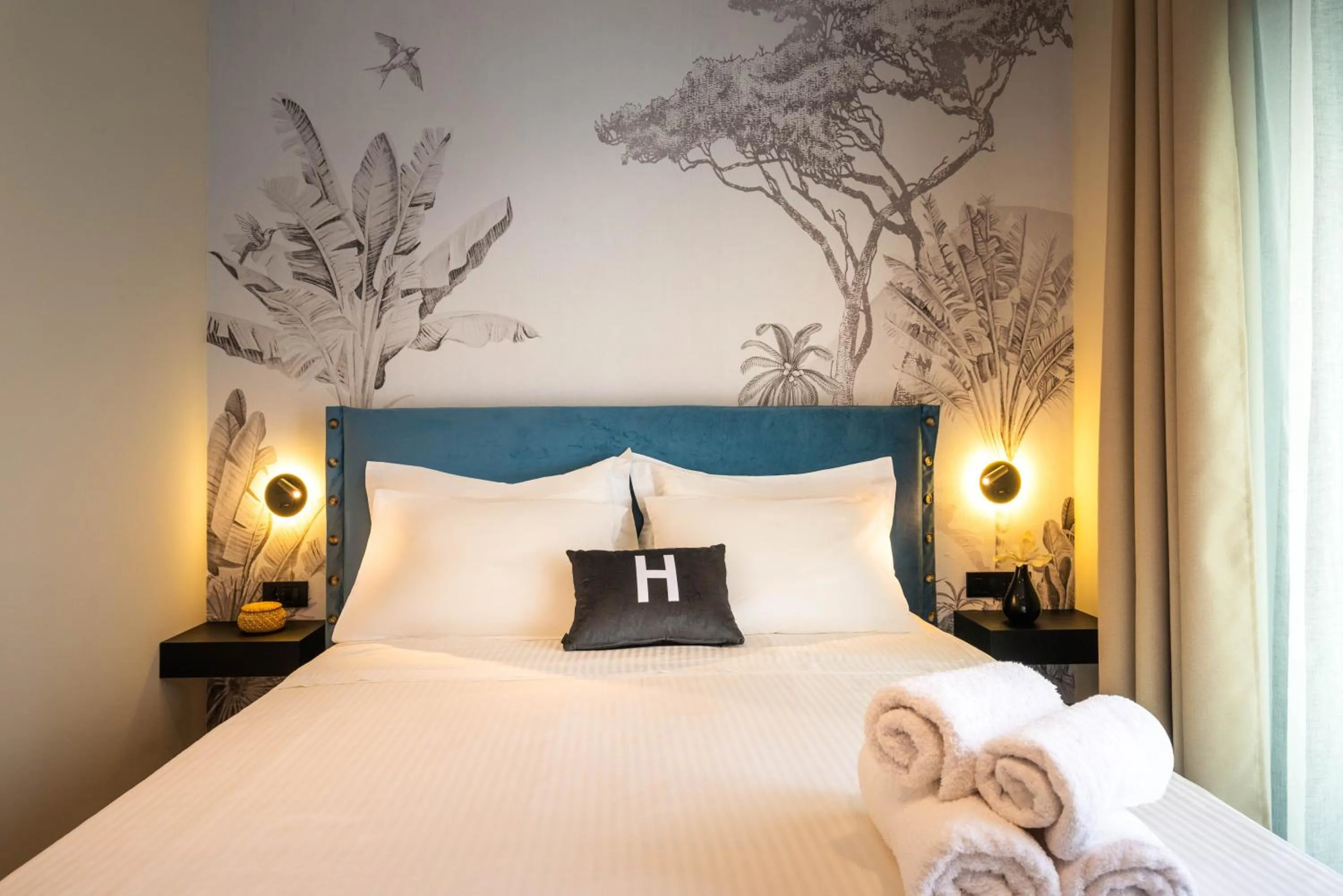 Bed in Hara Suites