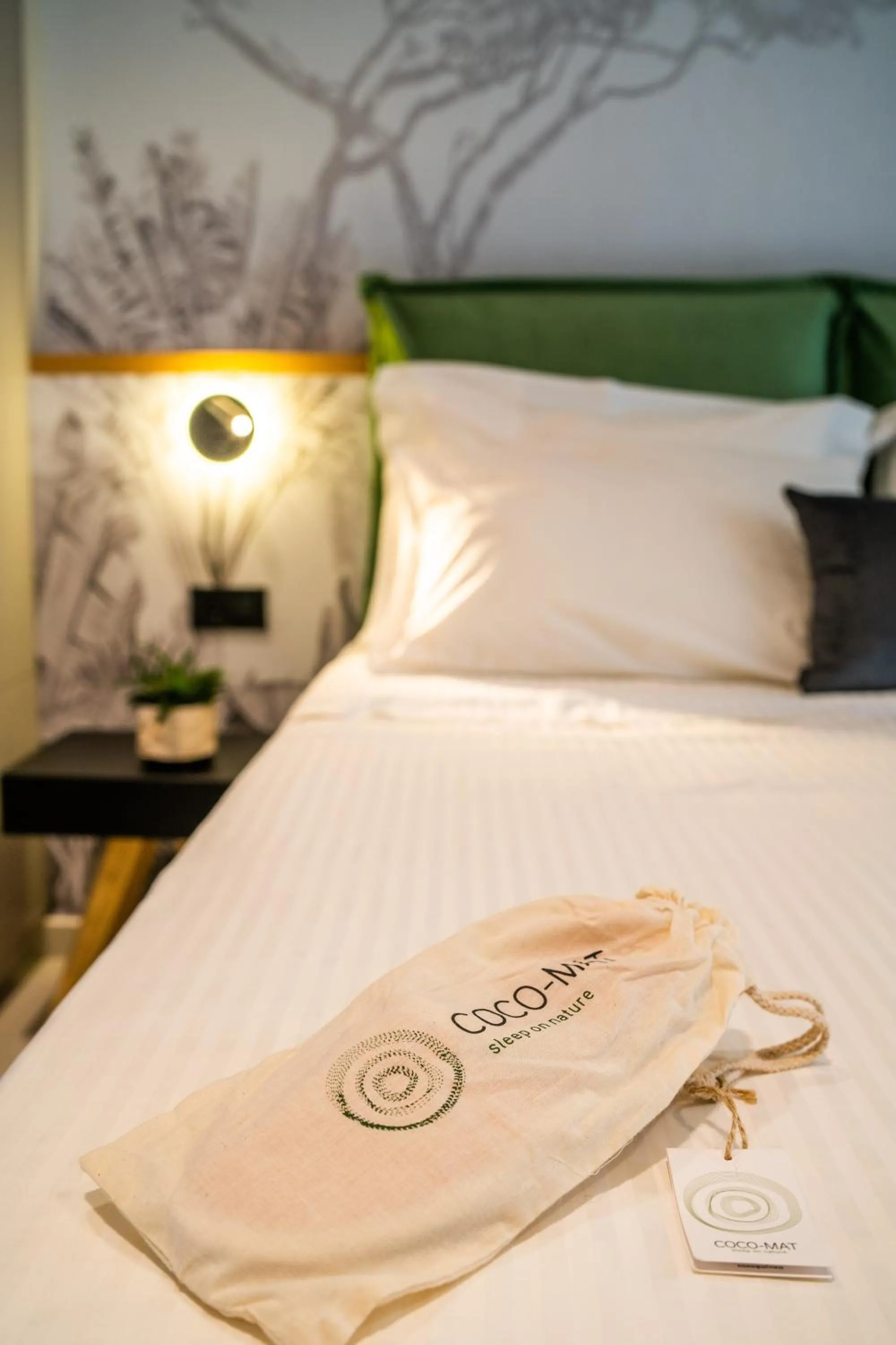 Bed in Hara Suites