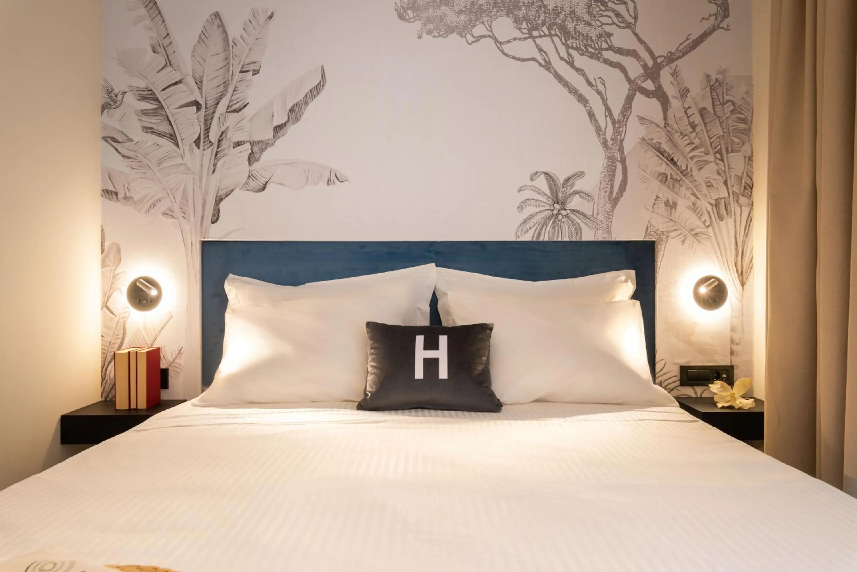 Bed in Hara Suites
