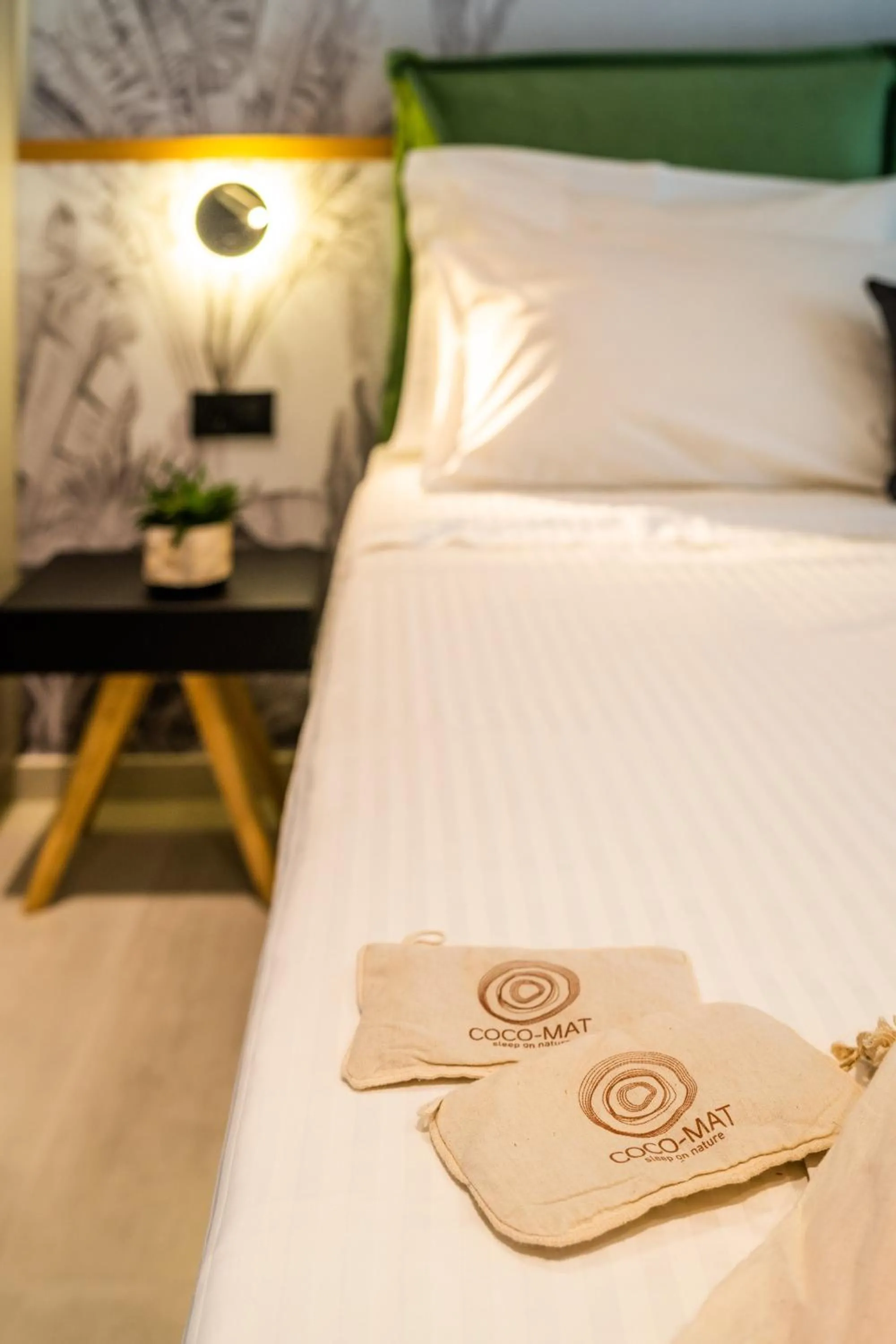 Bed in Hara Suites