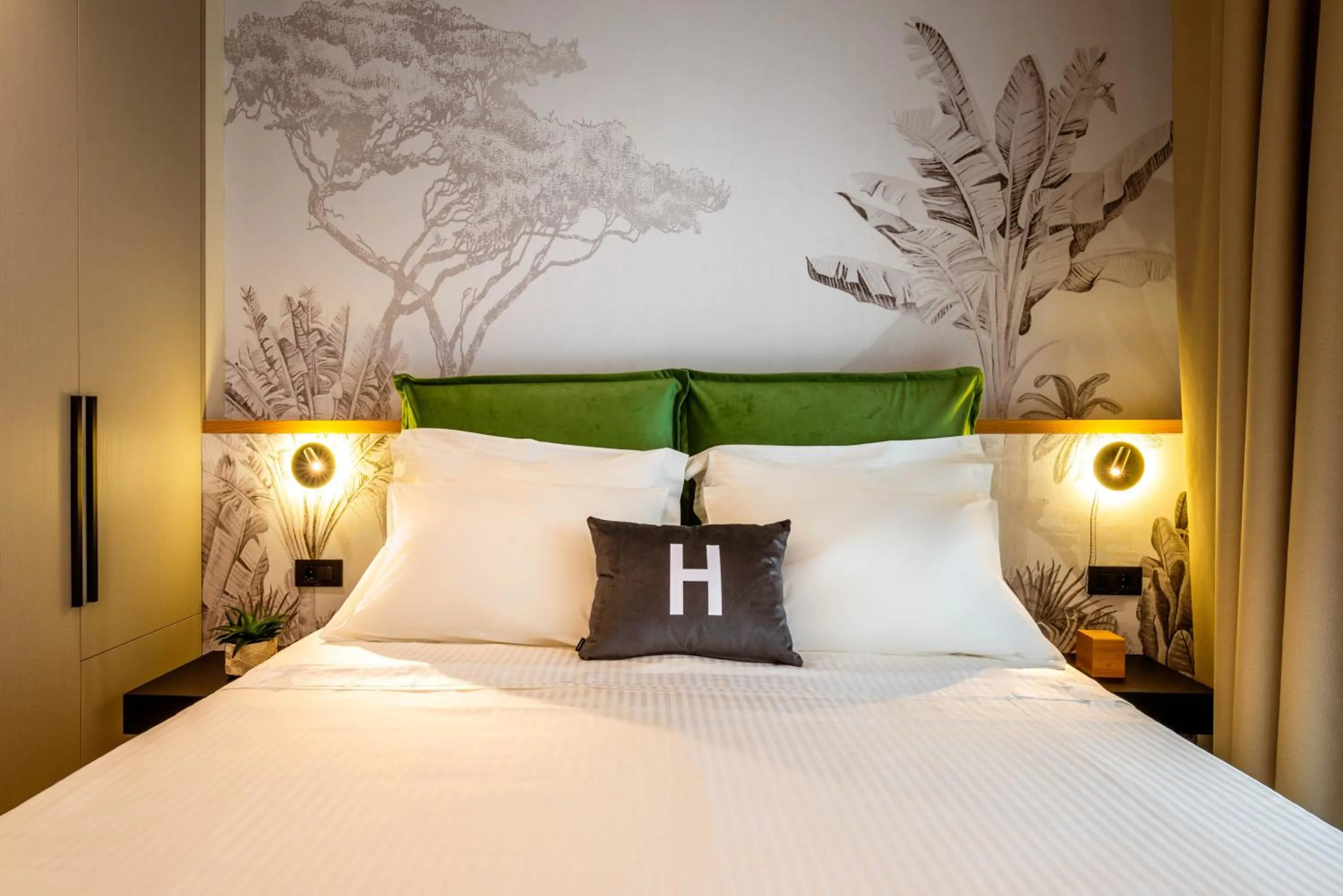 Bed in Hara Suites