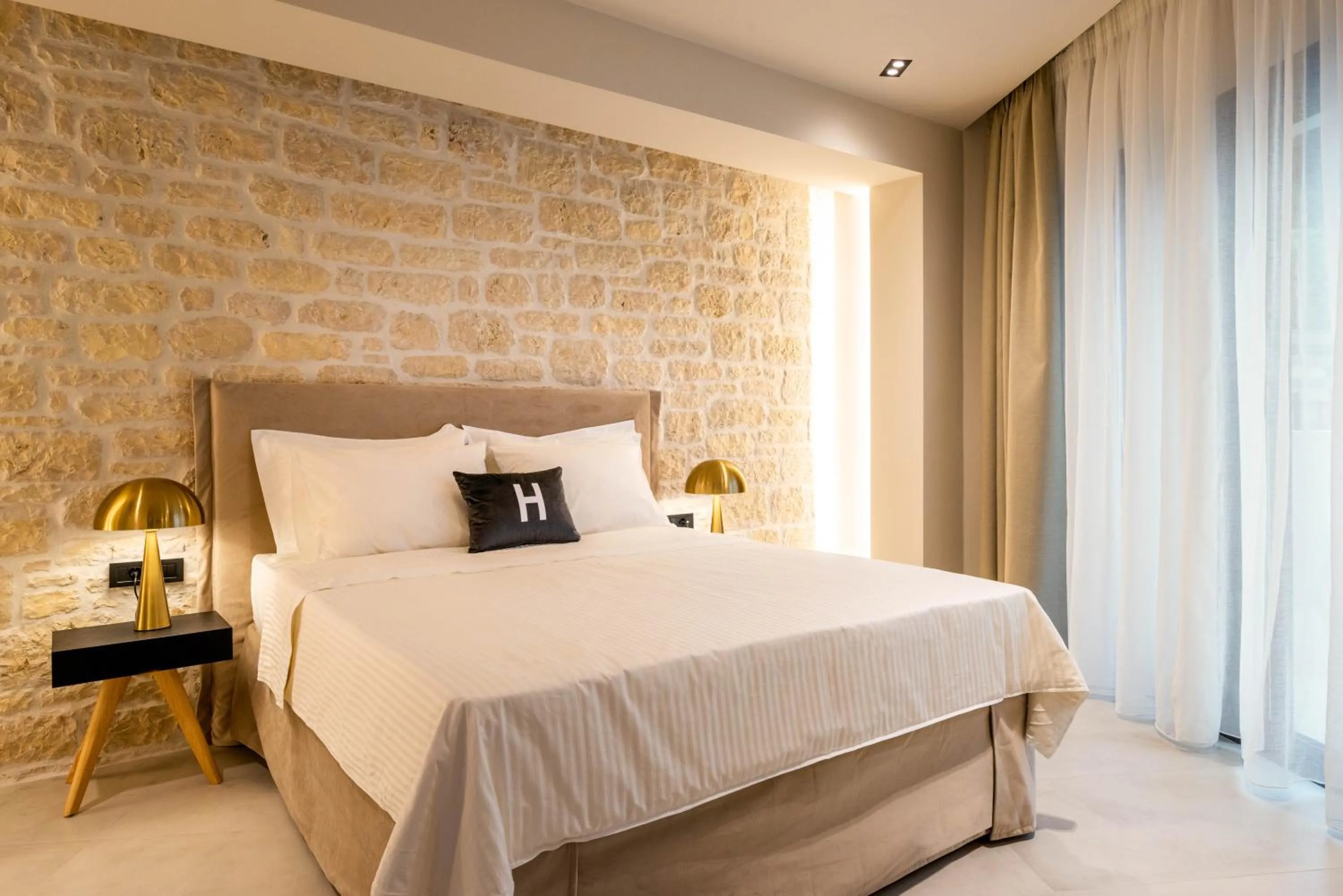 Bed in Hara Suites