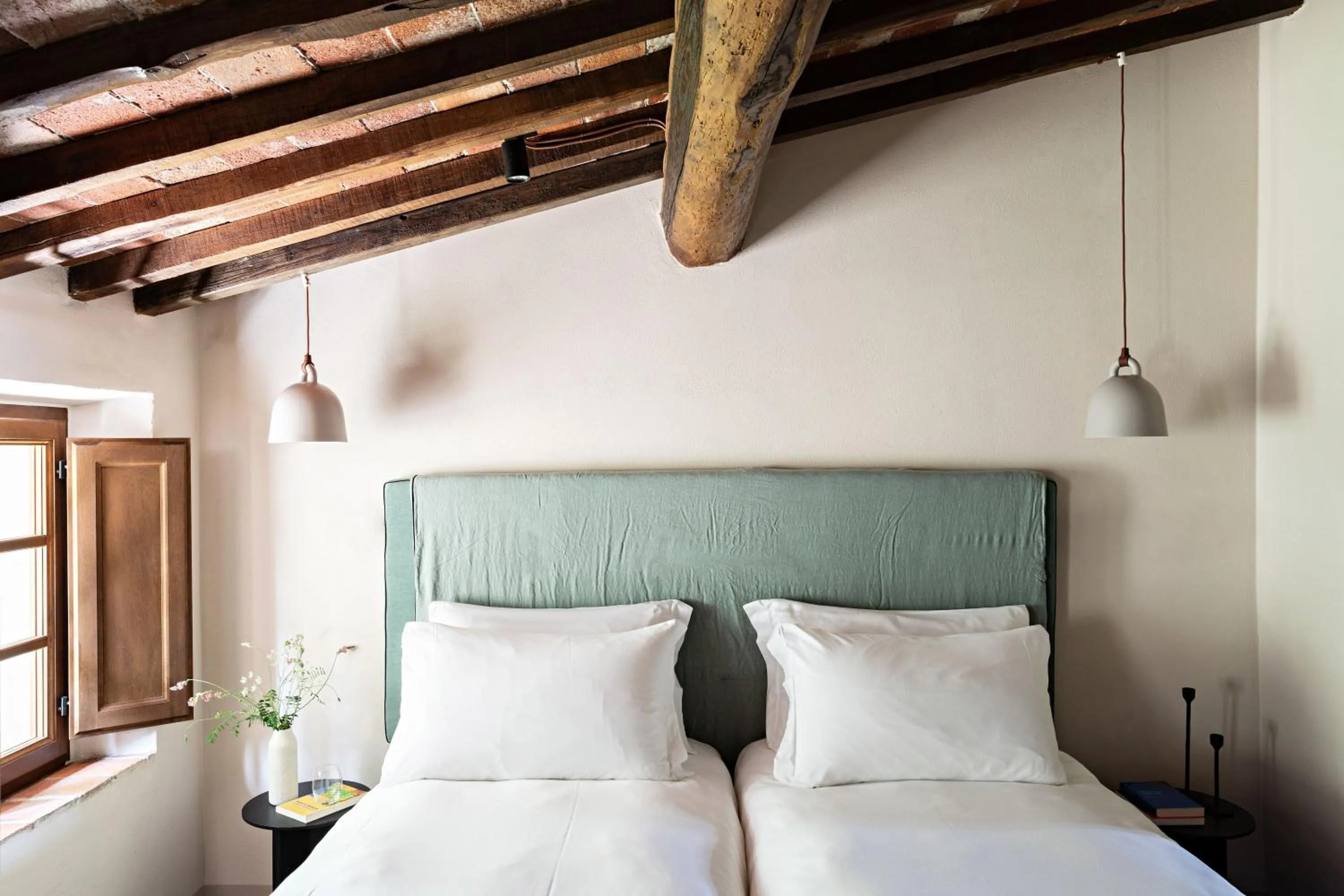 Bed in Pieve Aldina Relais & Châteaux