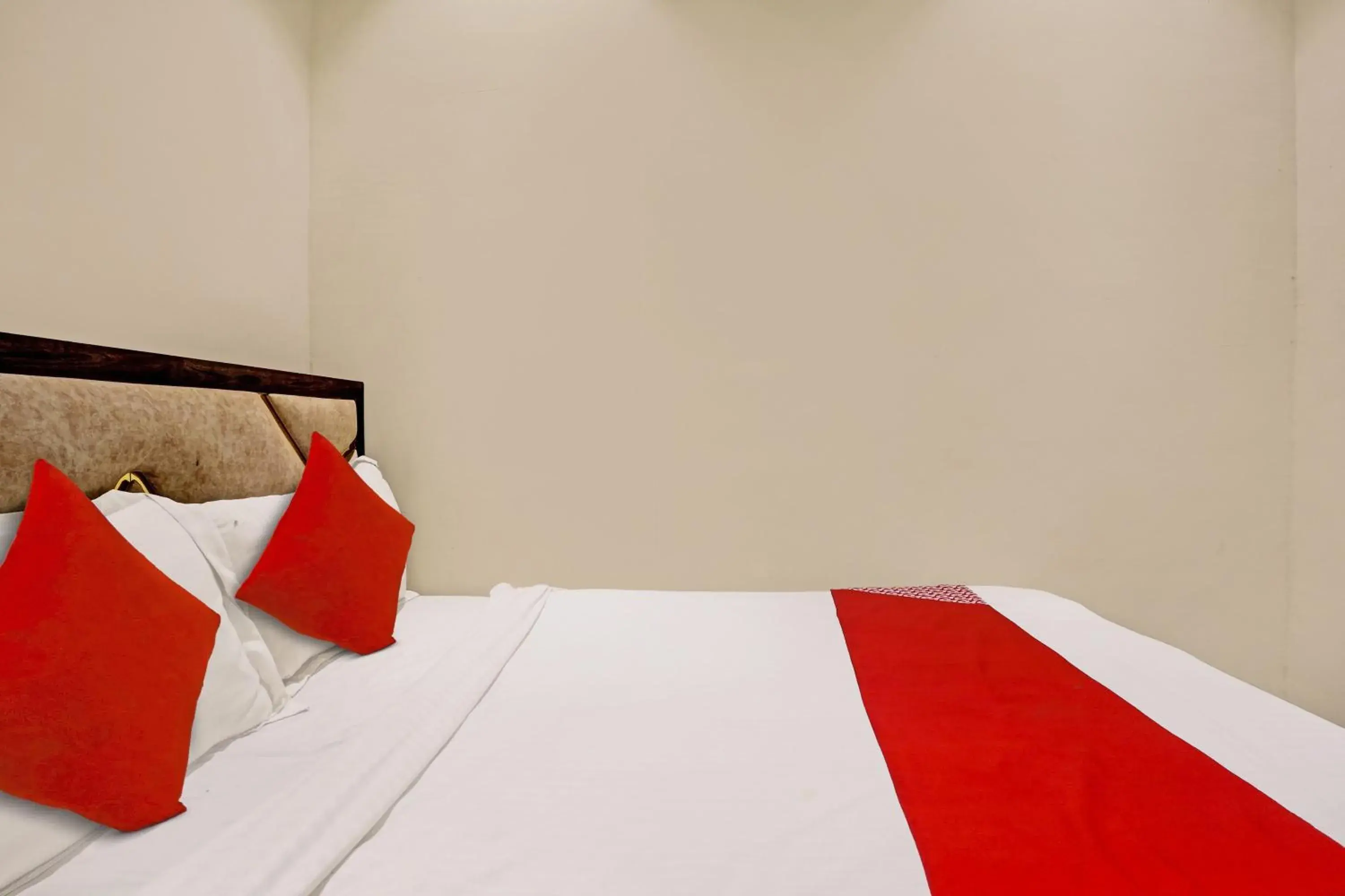 Bedroom in Hotel O NK Grand Bedroom in Hotel O NK Grand