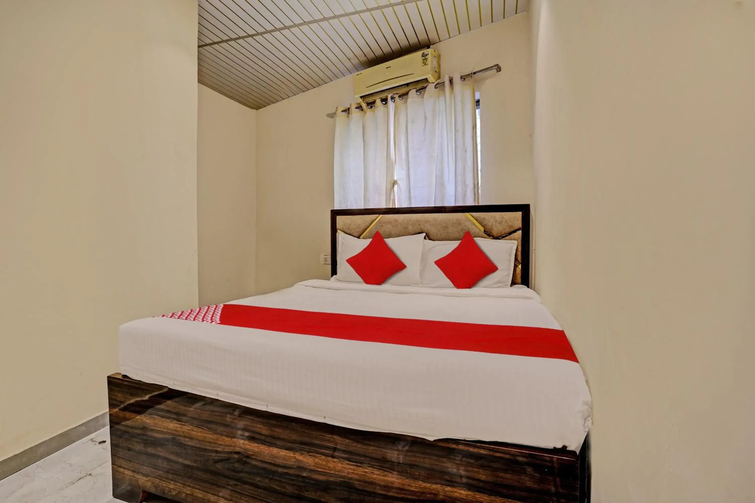 Bedroom in Hotel O NK Grand Bedroom in Hotel O NK Grand