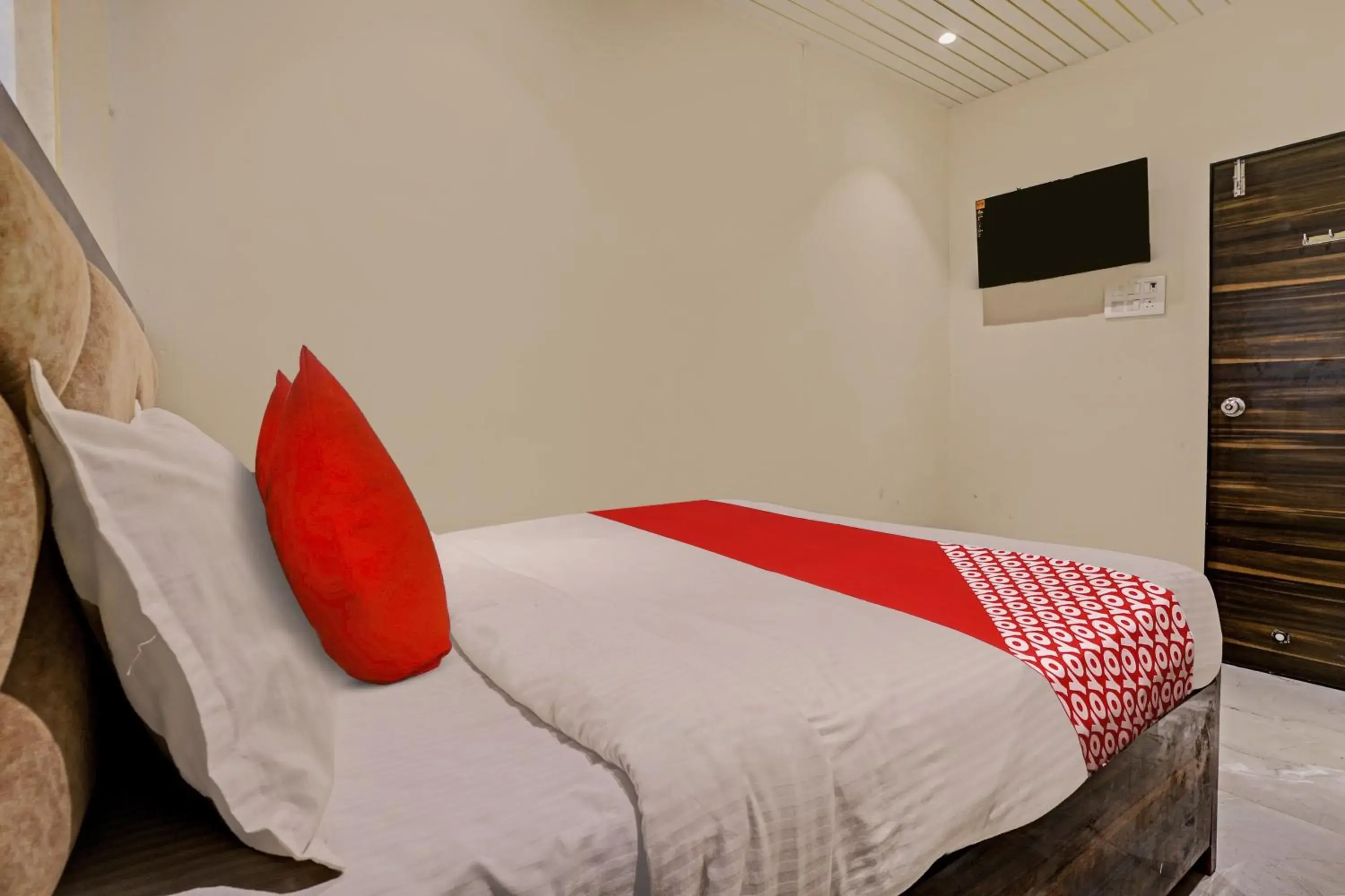 Bedroom in Hotel O NK Grand Bedroom in Hotel O NK Grand