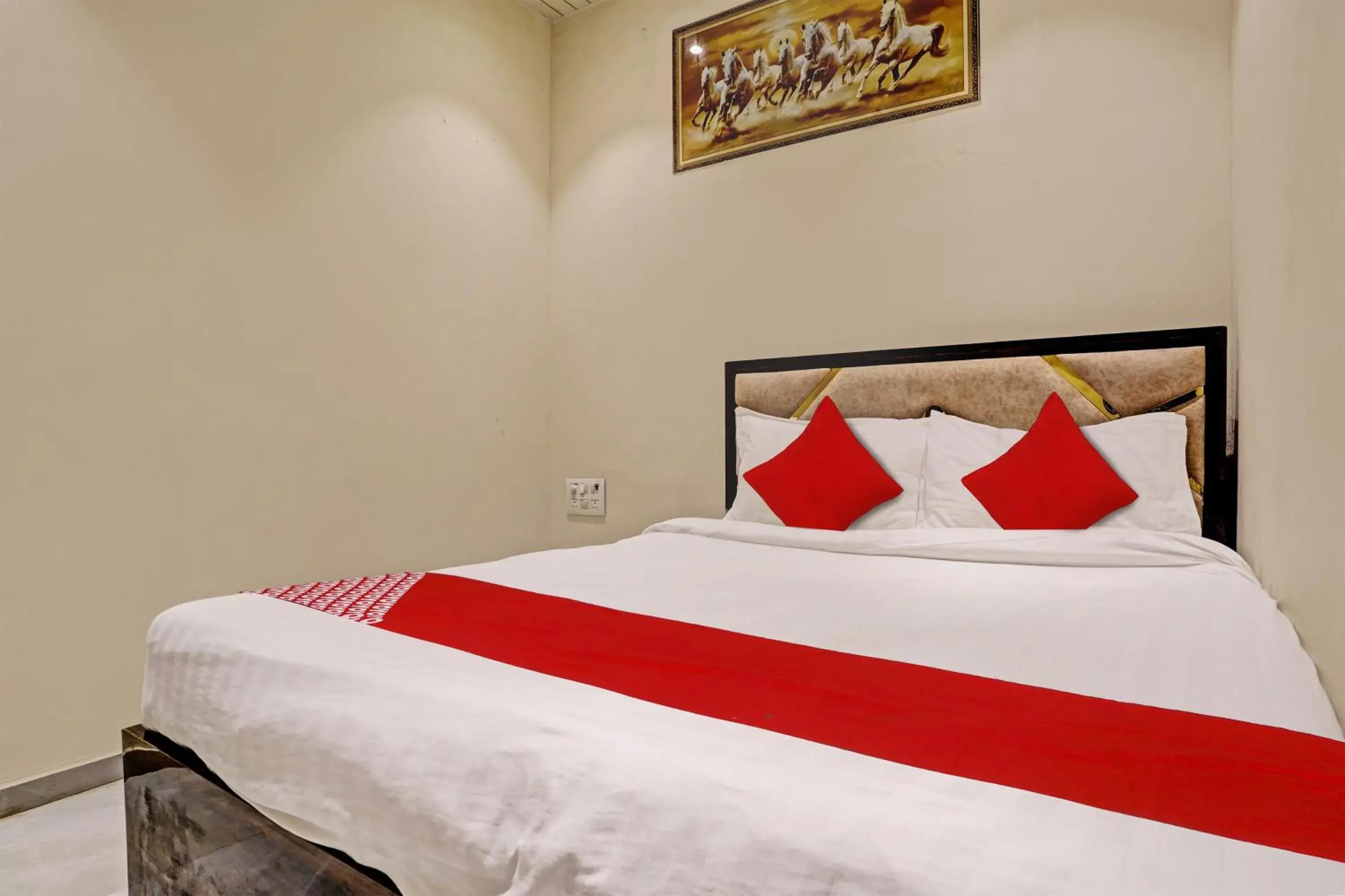 Bedroom in Hotel O NK Grand Bedroom in Hotel O NK Grand