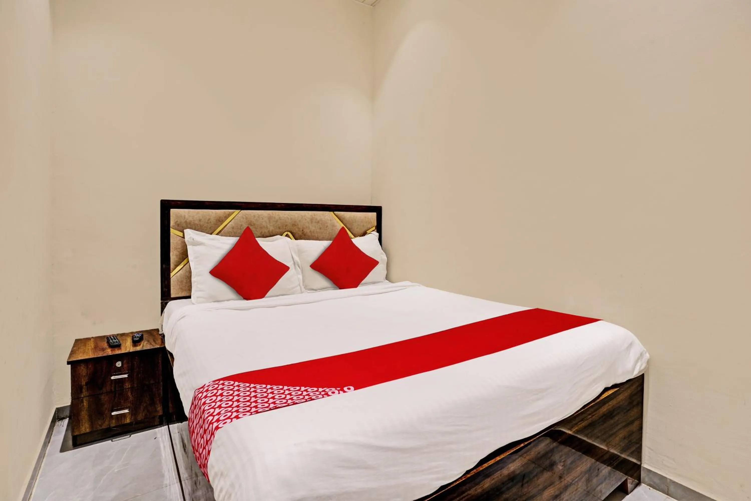 Bedroom in Hotel O NK Grand