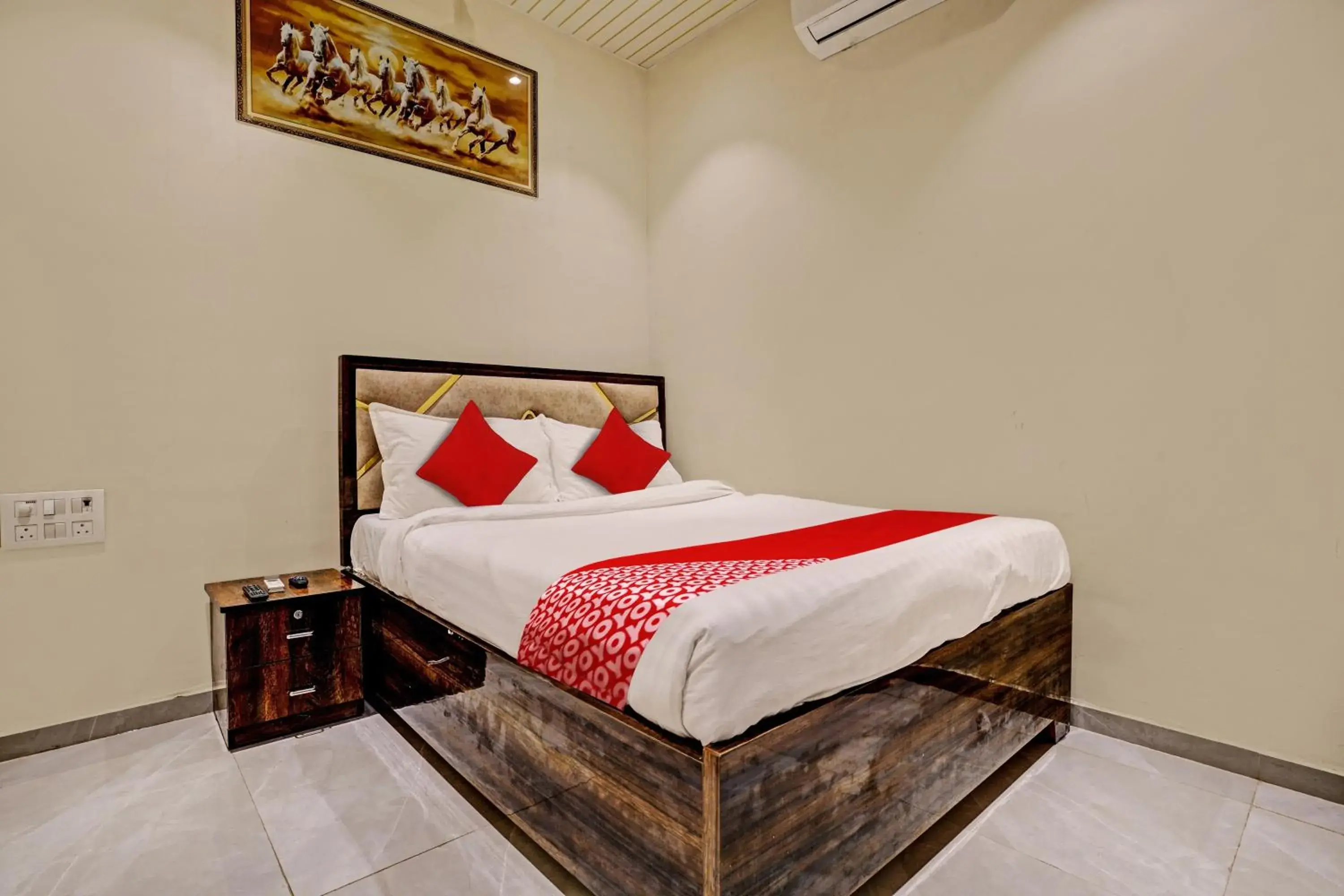 Bedroom in Hotel O NK Grand Bedroom in Hotel O NK Grand