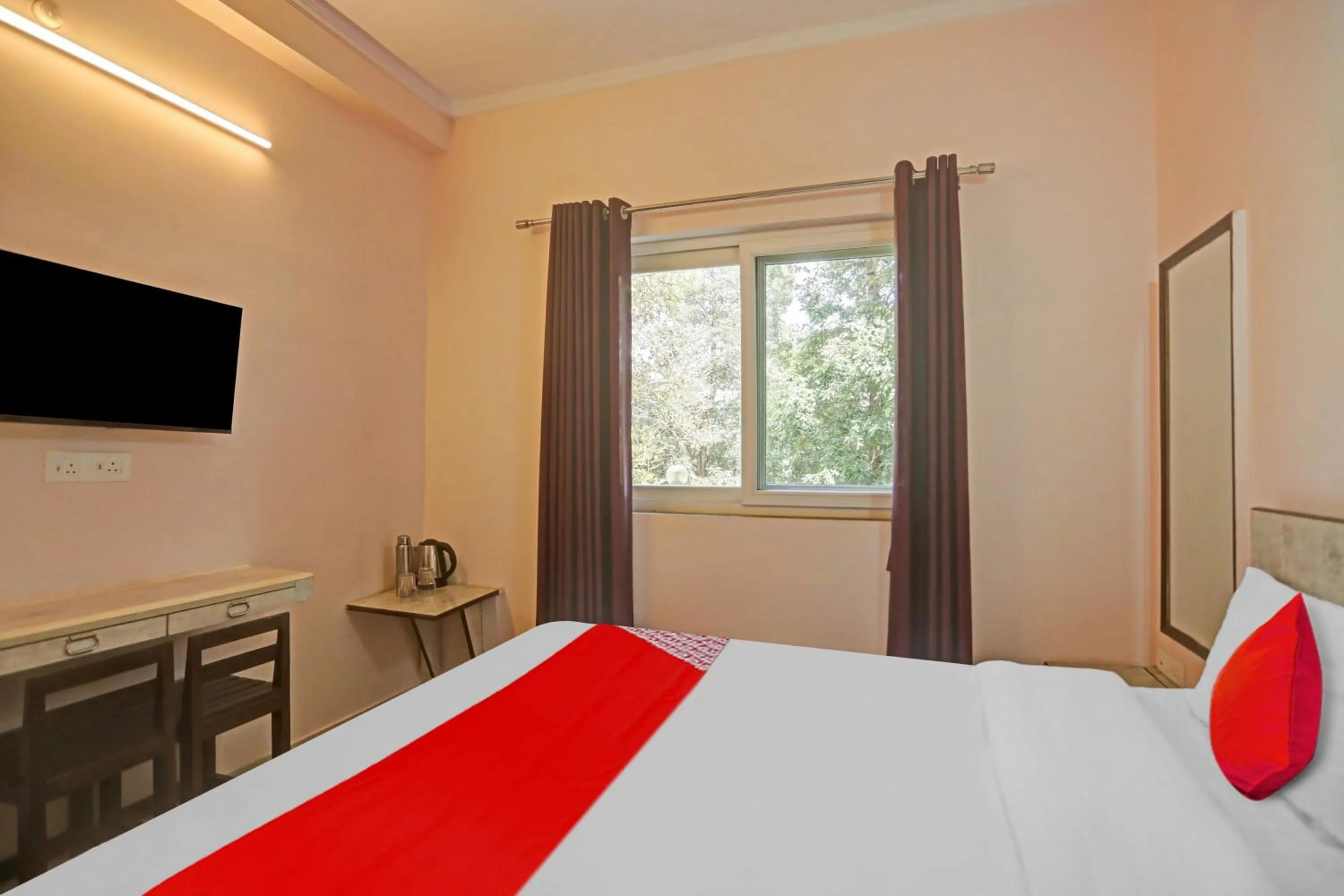 Bedroom in Hotel O by OYO Serene Escape