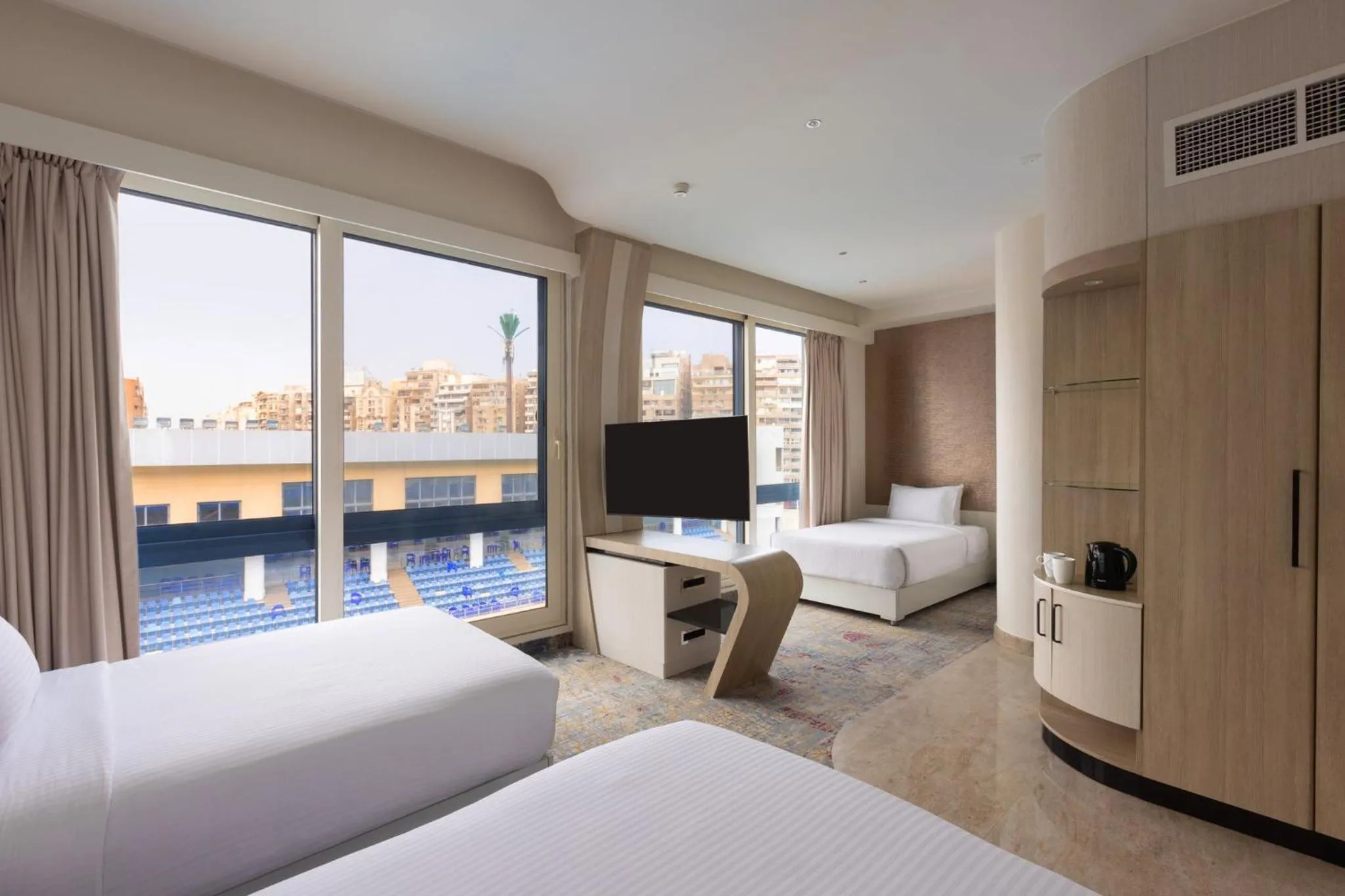 Photo of the whole room, Bed in Crowne Plaza Alexandria Mirage by IHG