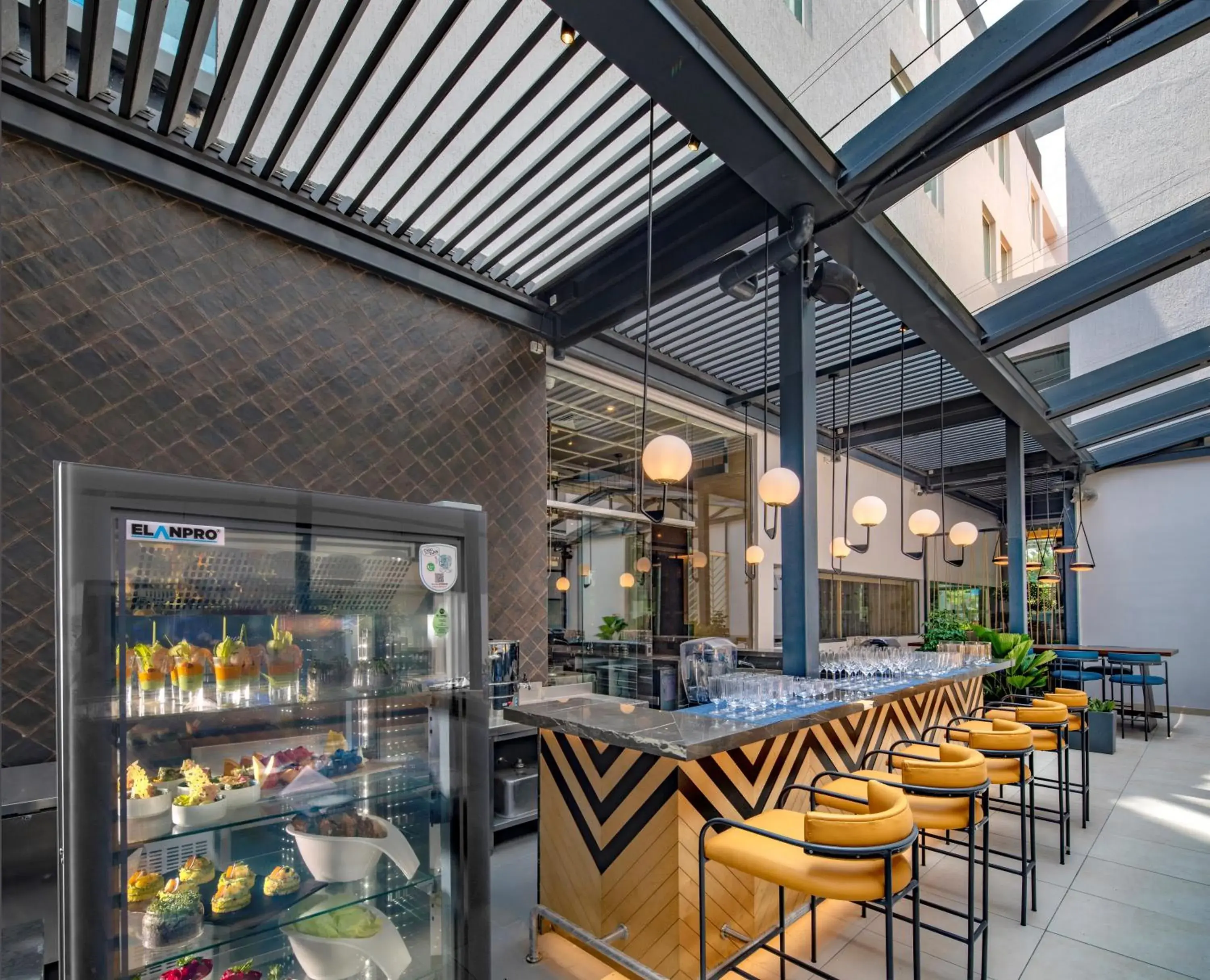 Lounge or bar in O by Tamara Coimbatore Lounge or bar in O by Tamara Coimbatore