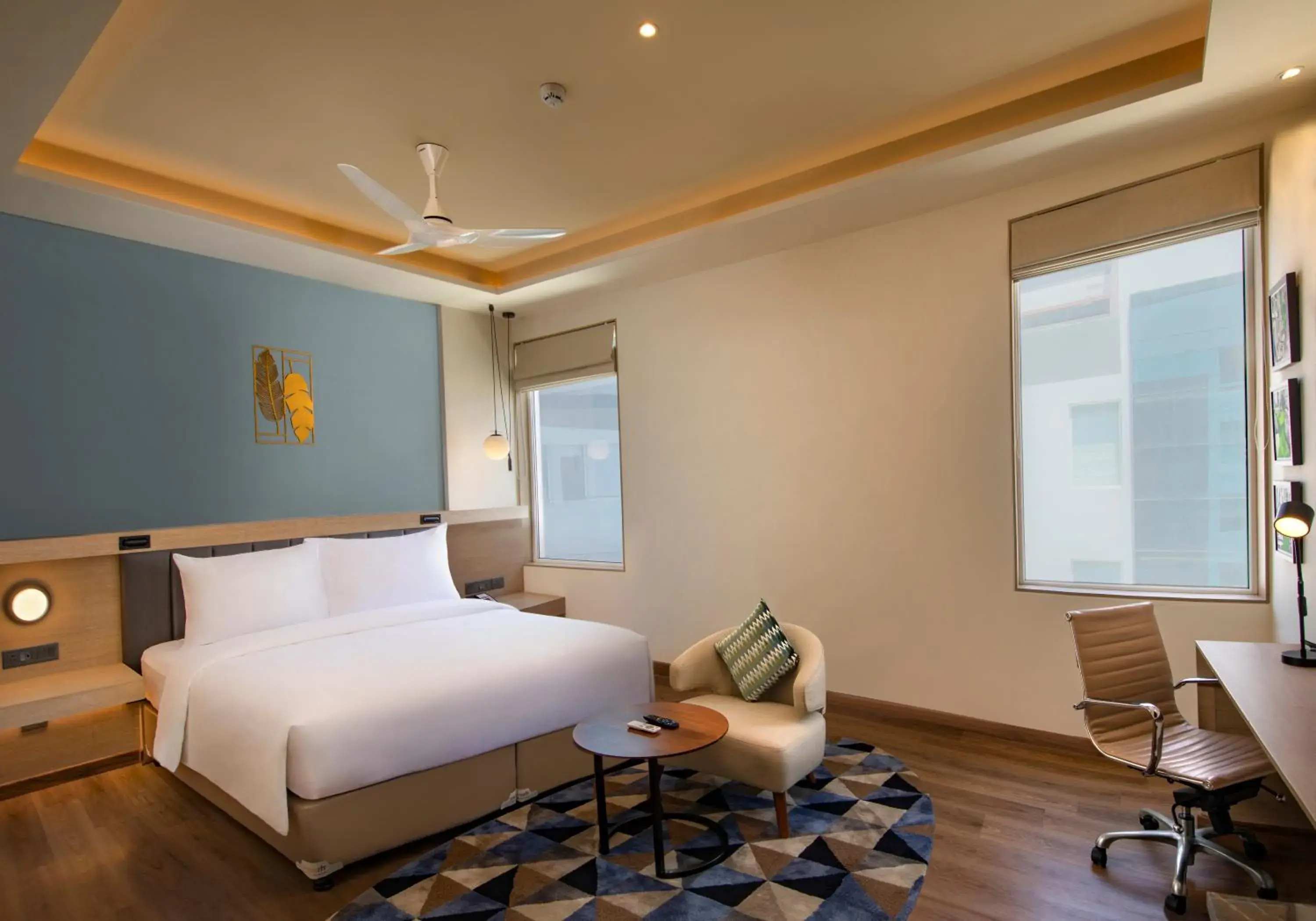 Seating area, Bed in O by Tamara Coimbatore Seating area, Bed in O by Tamara Coimbatore