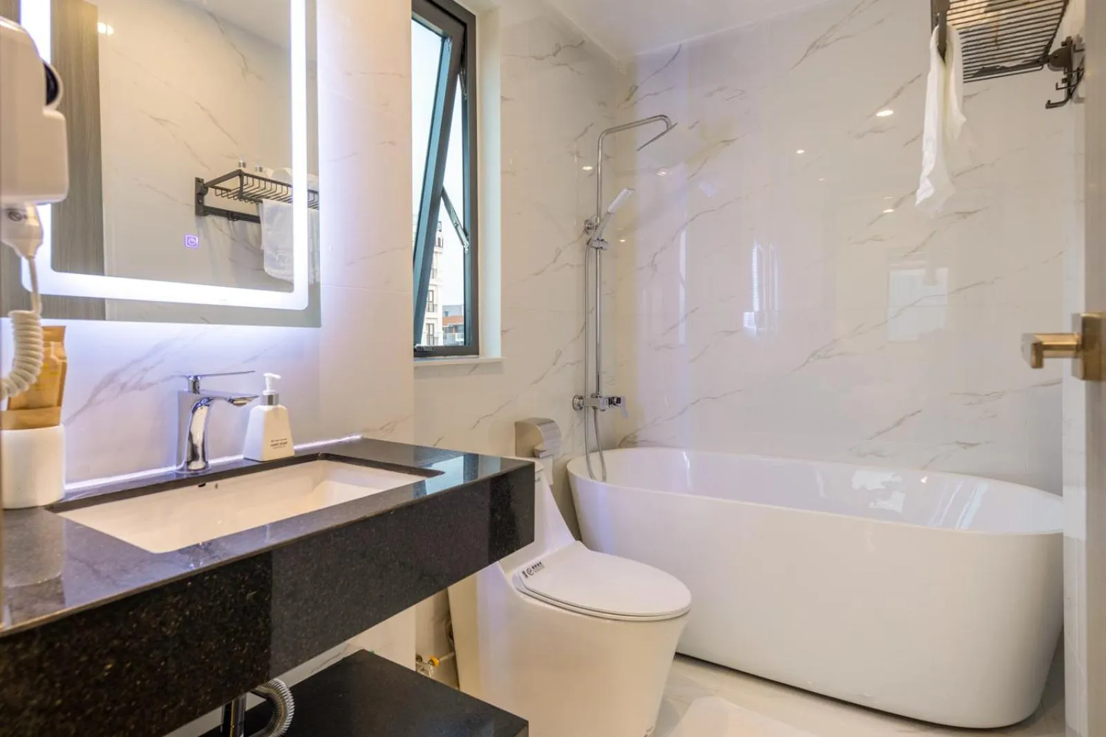 Shower in The Home Hotel & Apartment