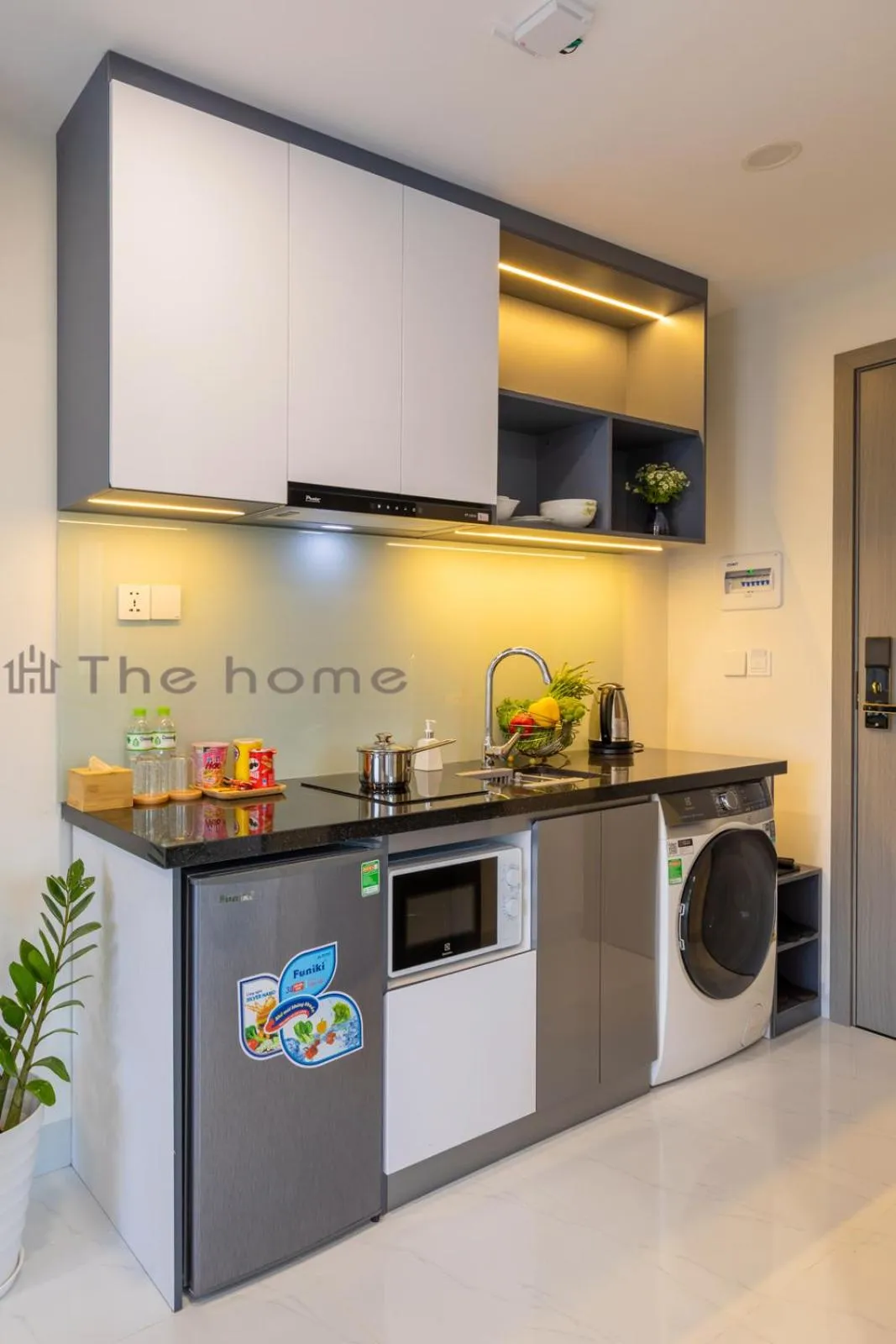 stove in The Home Hotel & Apartment