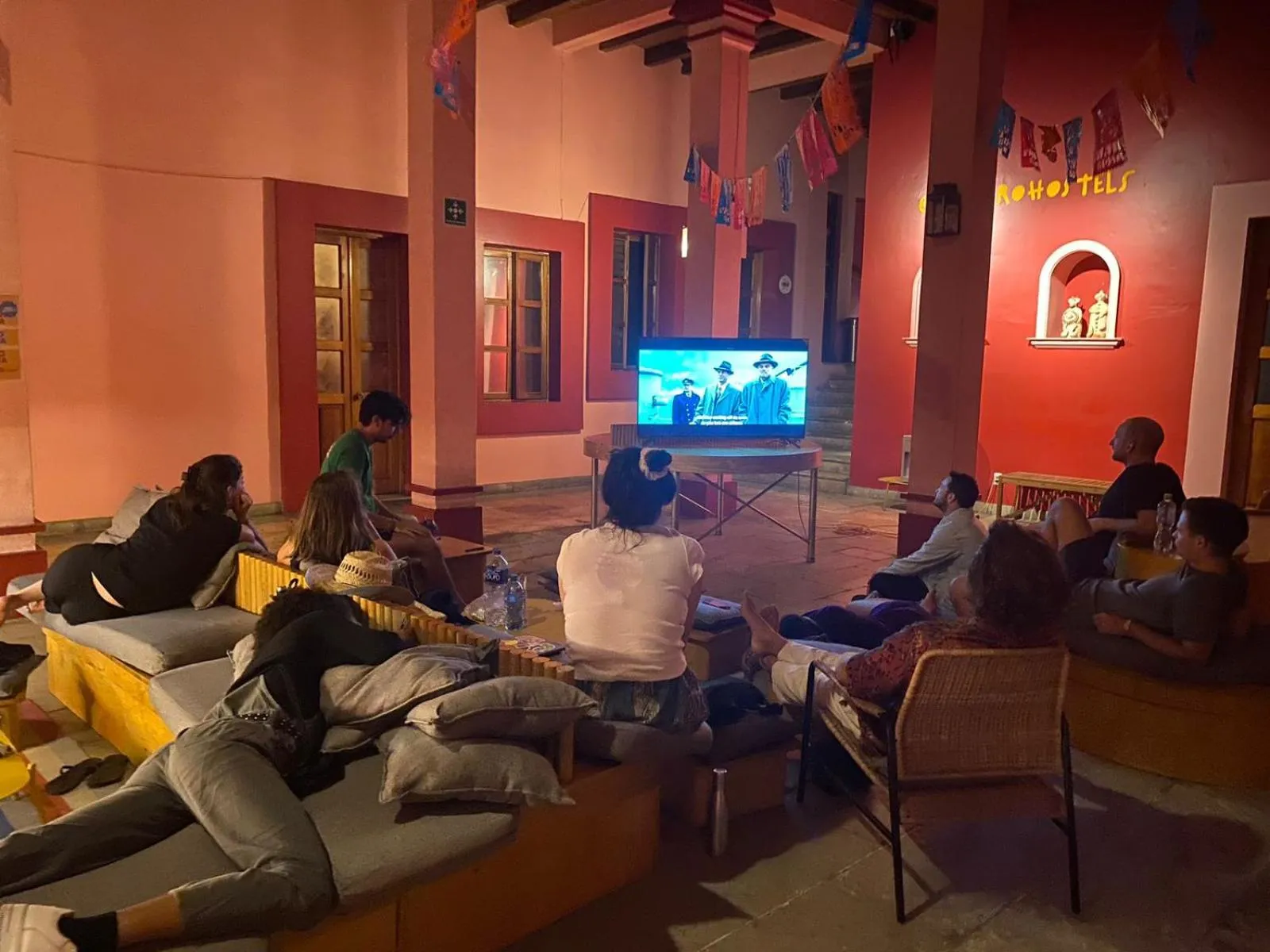 Communal lounge/ TV room in Viajero Oaxaca Hostel