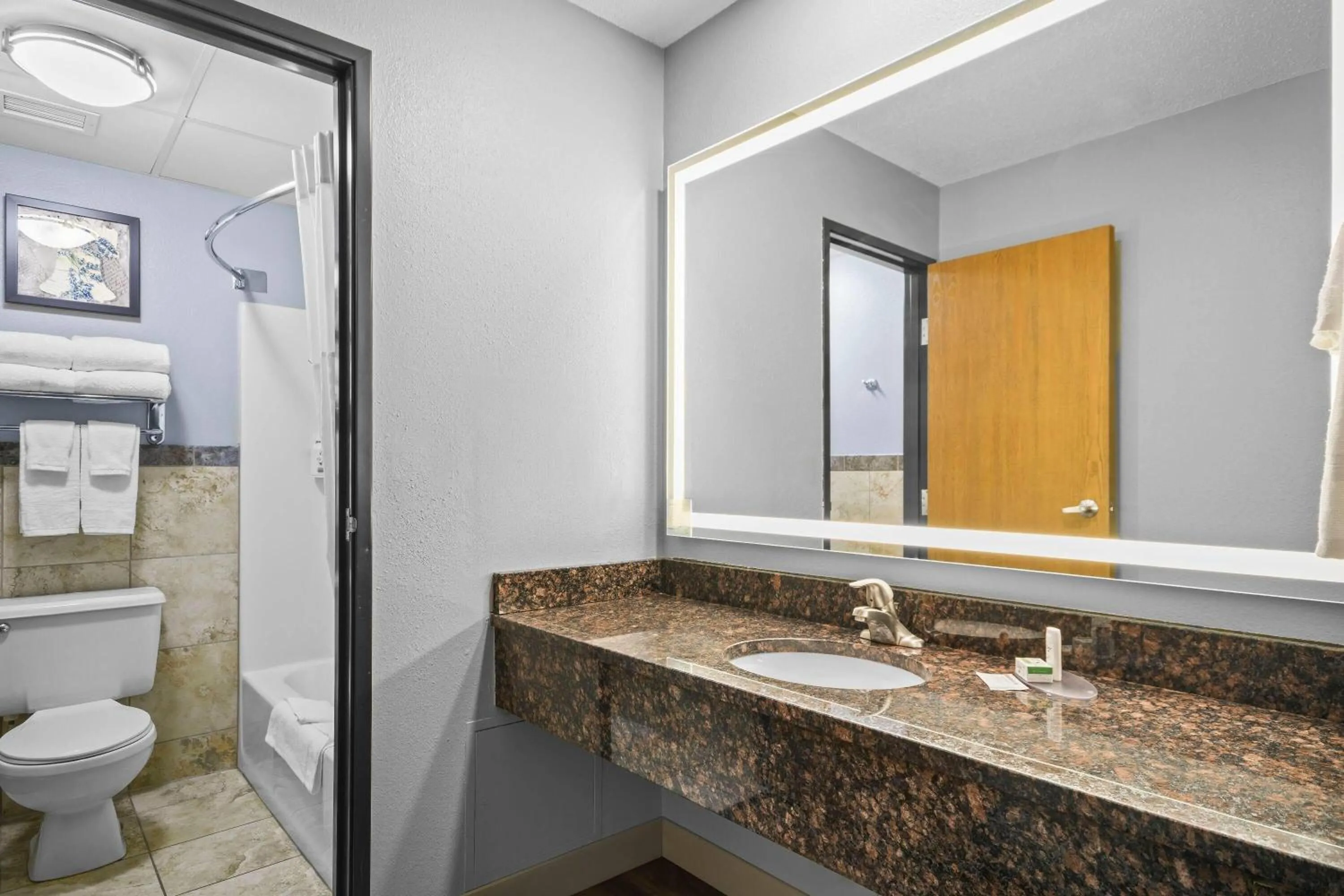 Bathroom in AmericInn by Wyndham Virginia