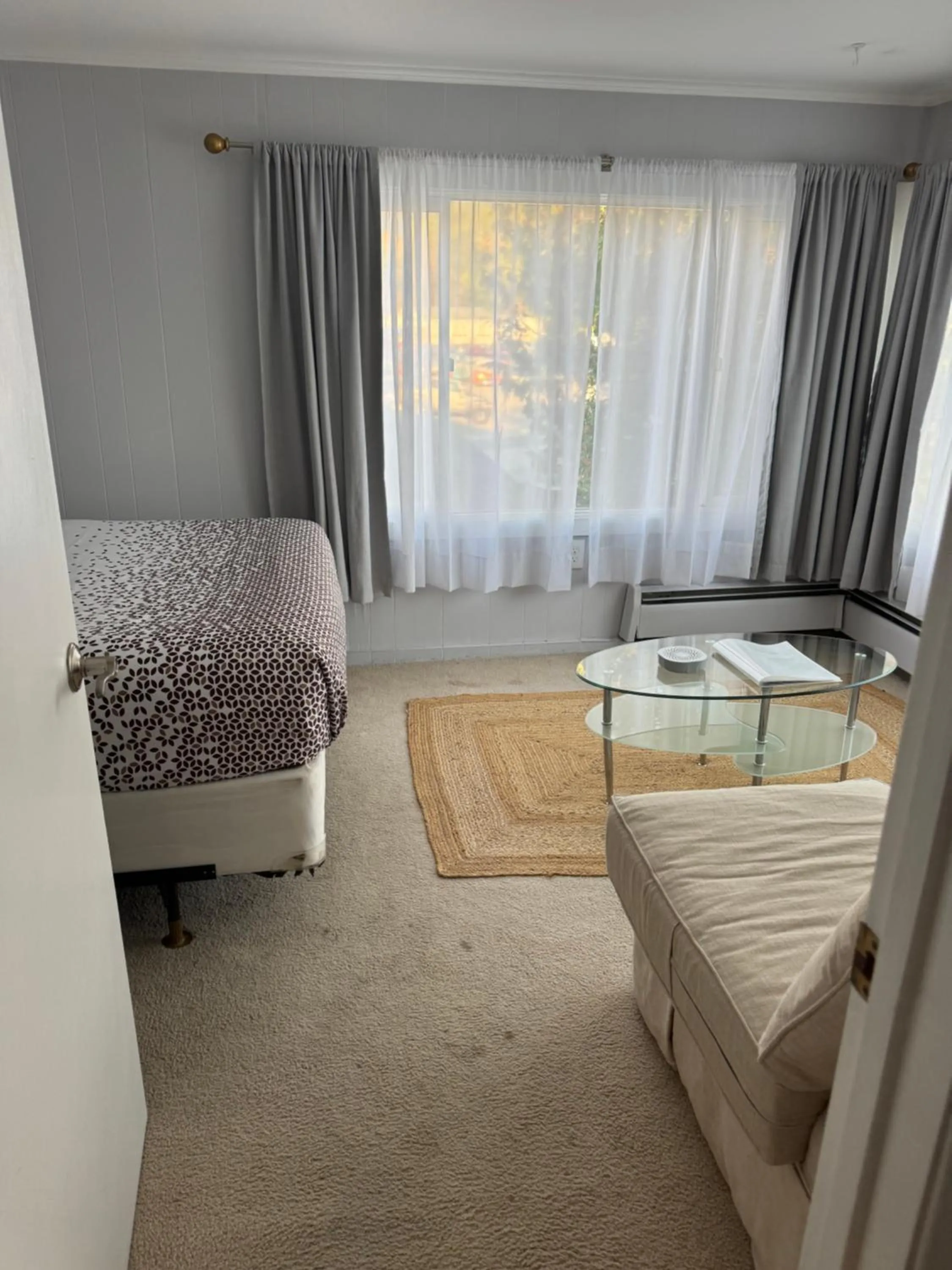 Bed in Knotty Pine Motel