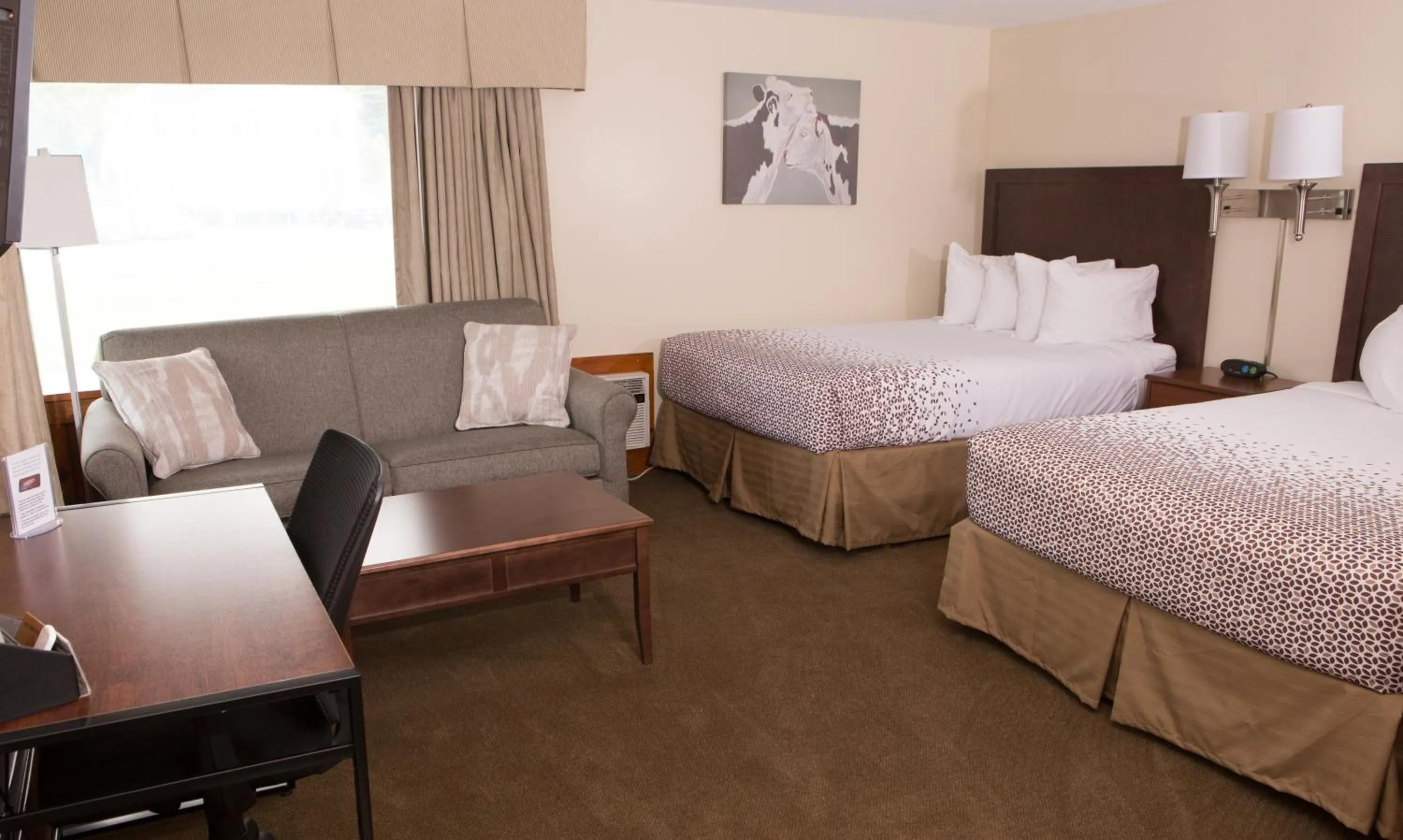 Bed in Knotty Pine Motel