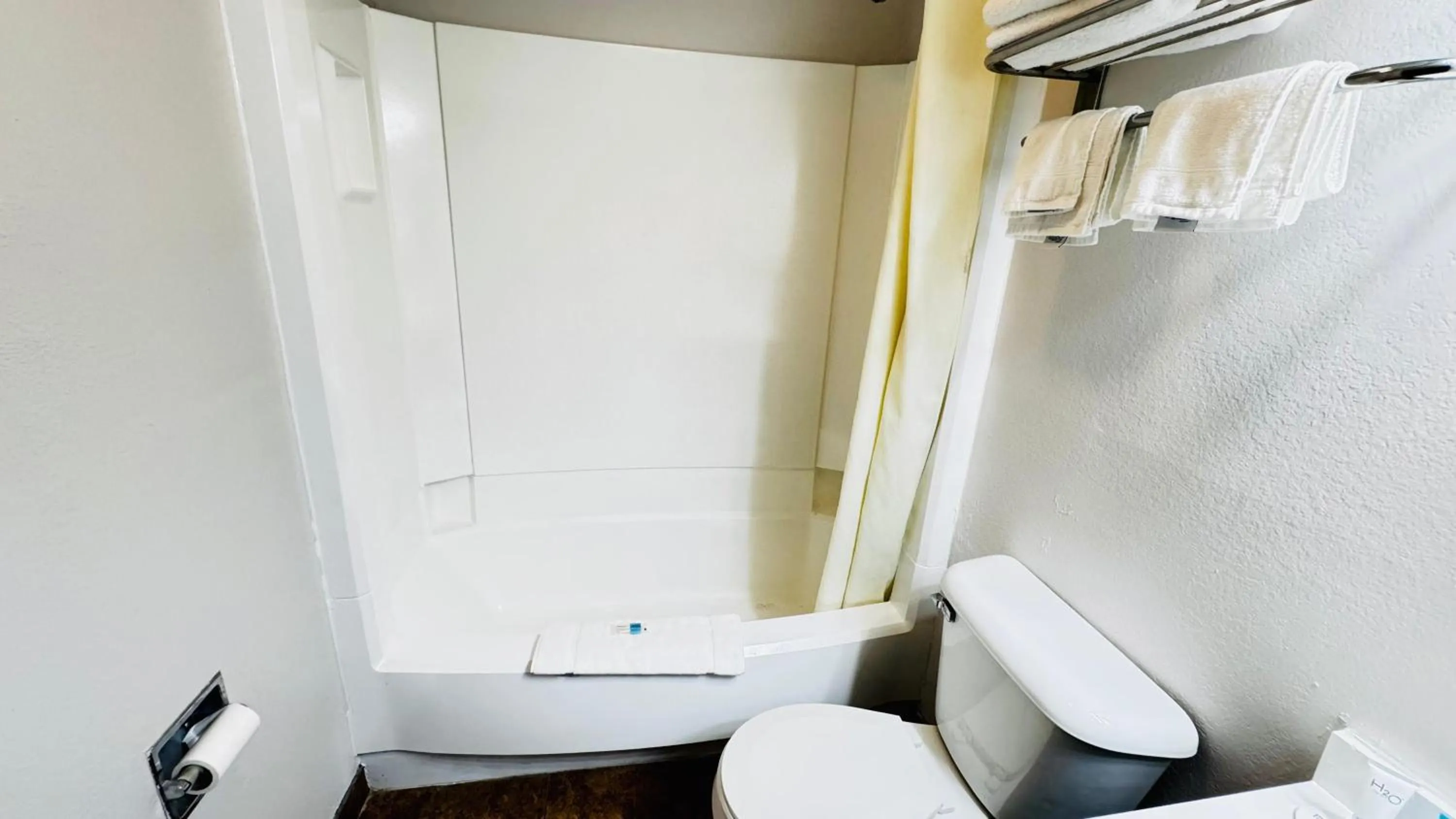 Bathroom in Super 8 by Wyndham North Platte