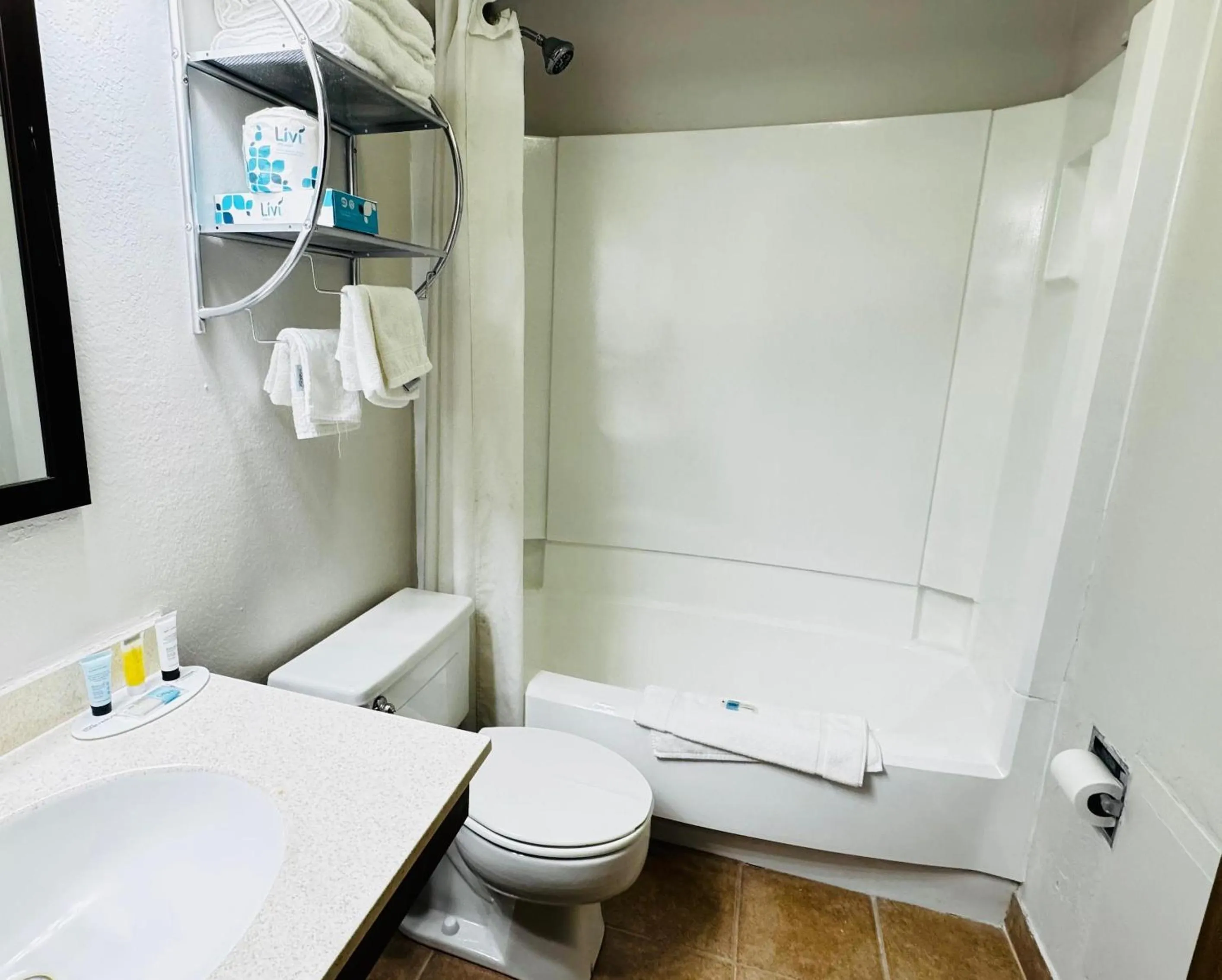 Bathroom in Super 8 by Wyndham North Platte