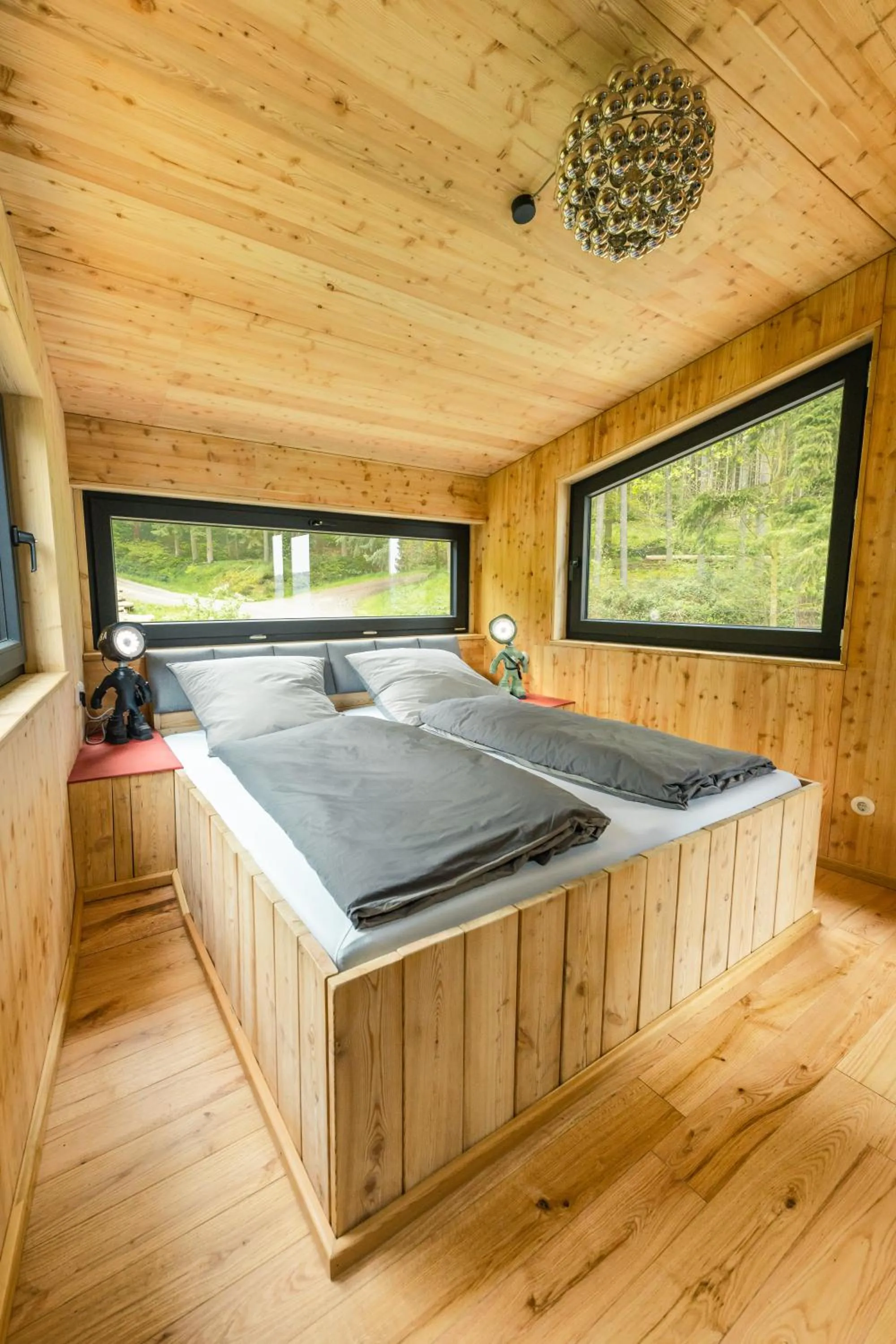 Bed in Baumhausapartment