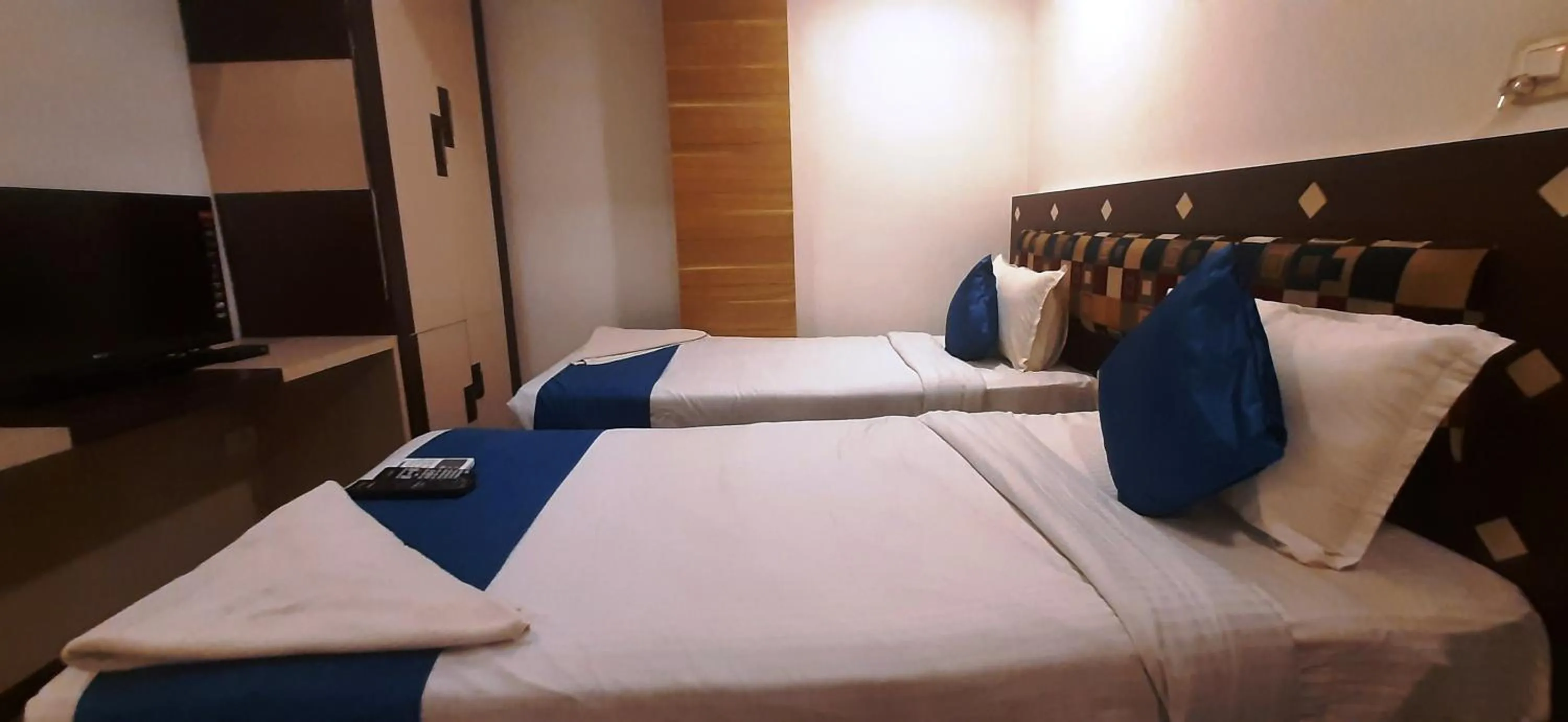 Bed in Hotel Kosala Vijayawada